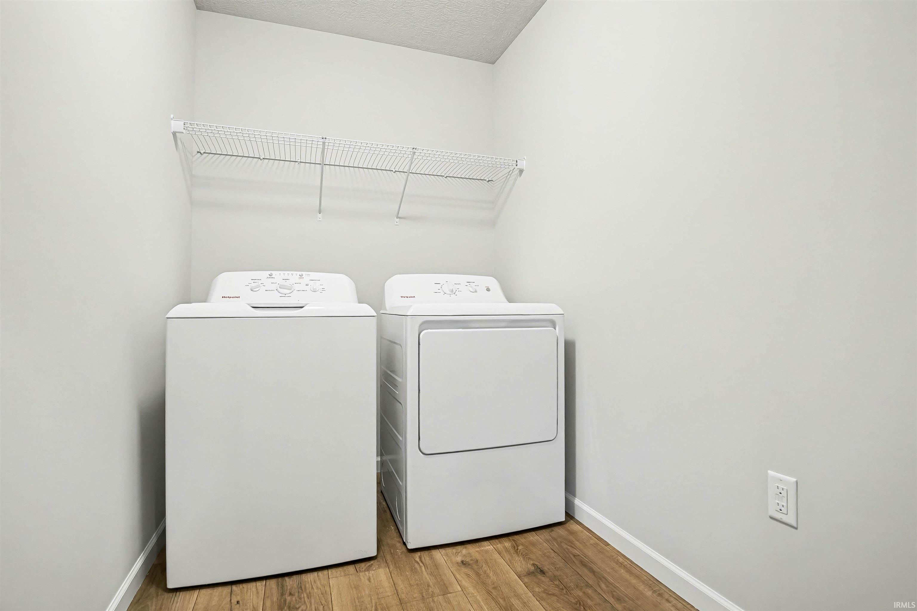 The laundry room is situated near all bedrooms and includes the washer & dryer!
