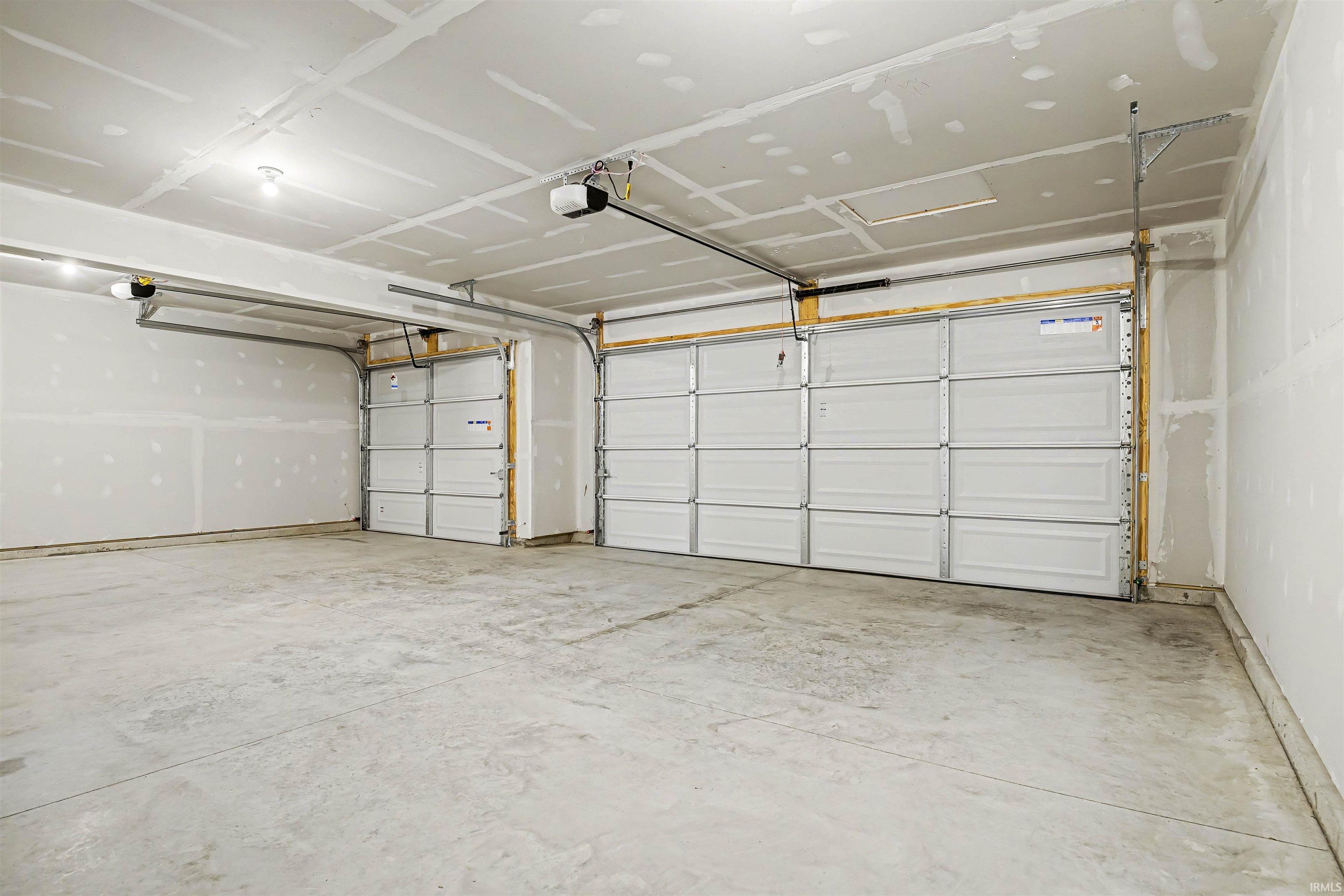 2 stall attached garage with 10x18 third stall