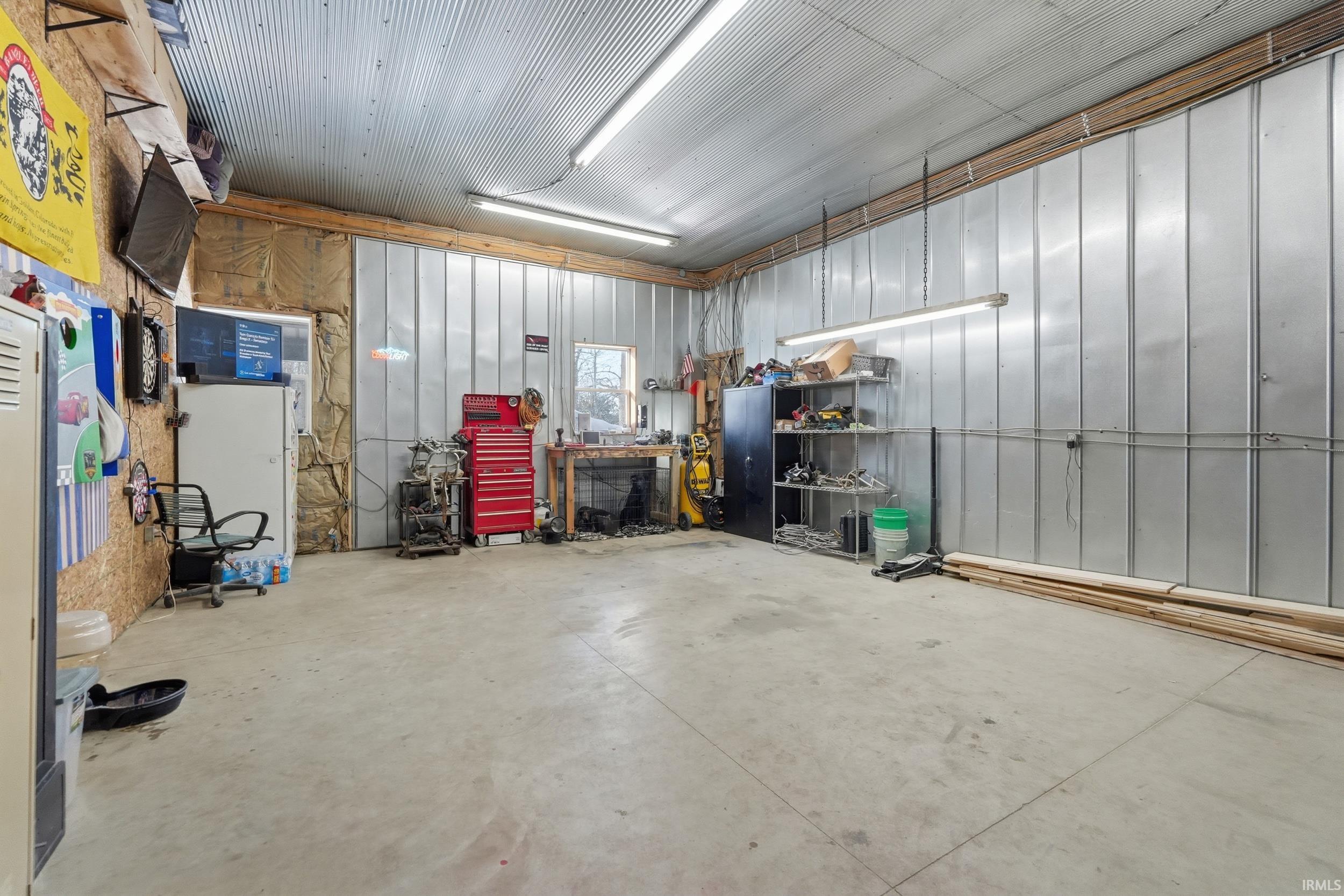 Garage featuring a workshop area