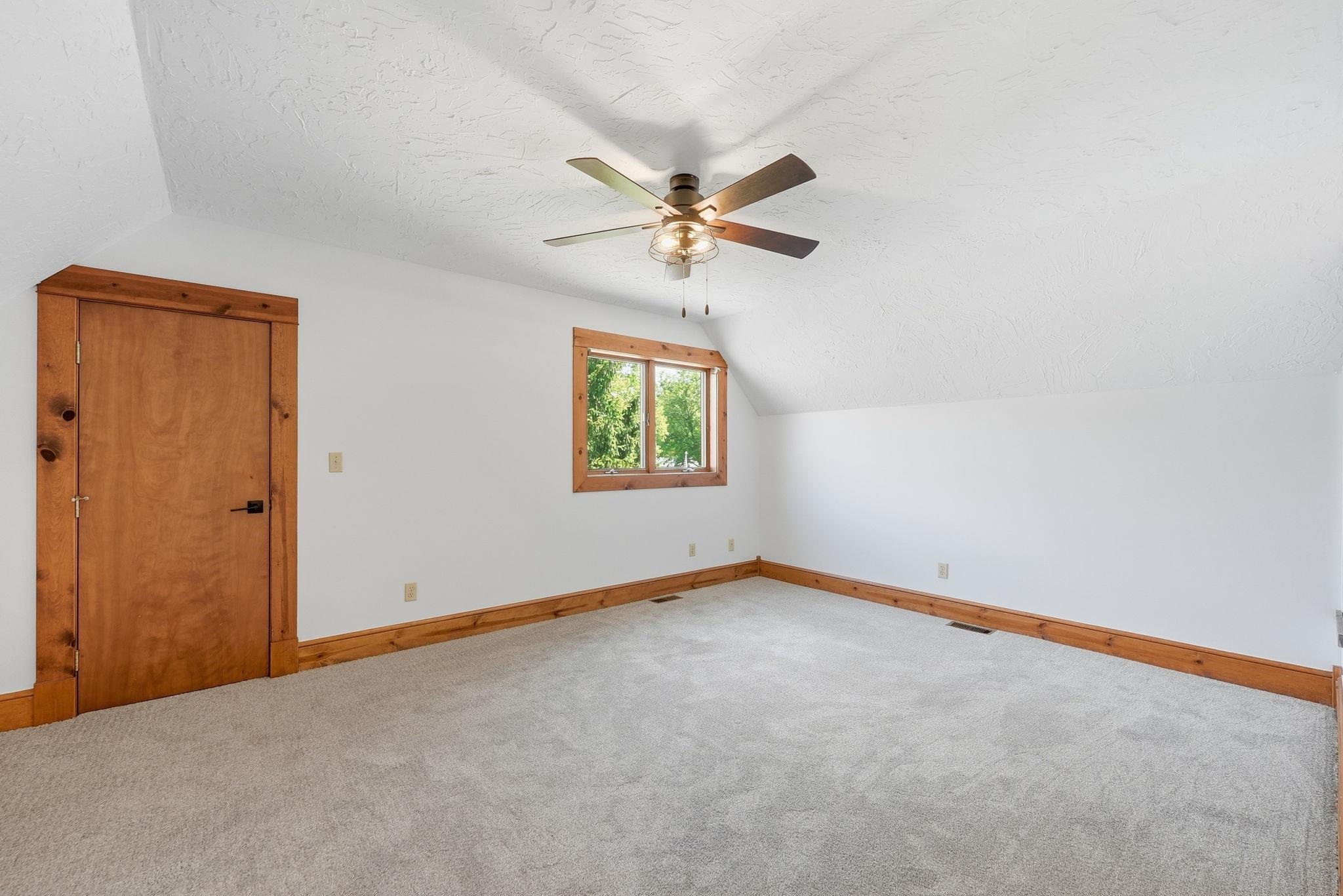 NEW Carpet & paint, and New celling FAN and shelving in closet plus wood trim and bedroom door.