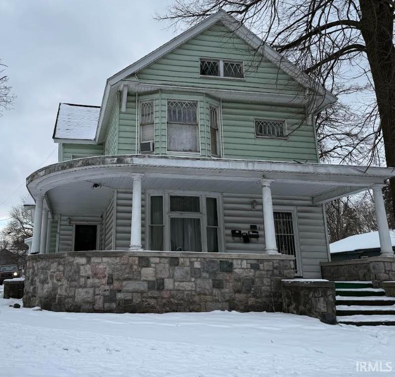 View of front of house with a porch