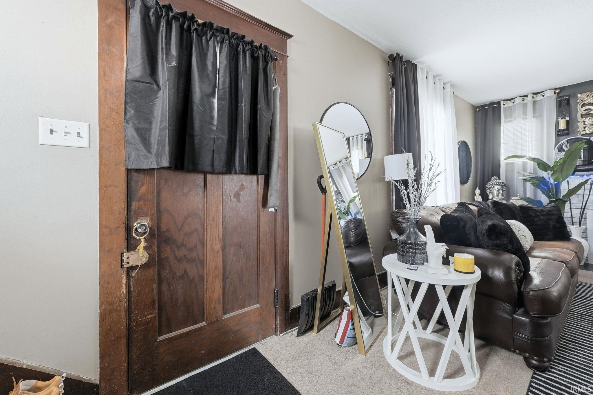Living room with light colored carpet