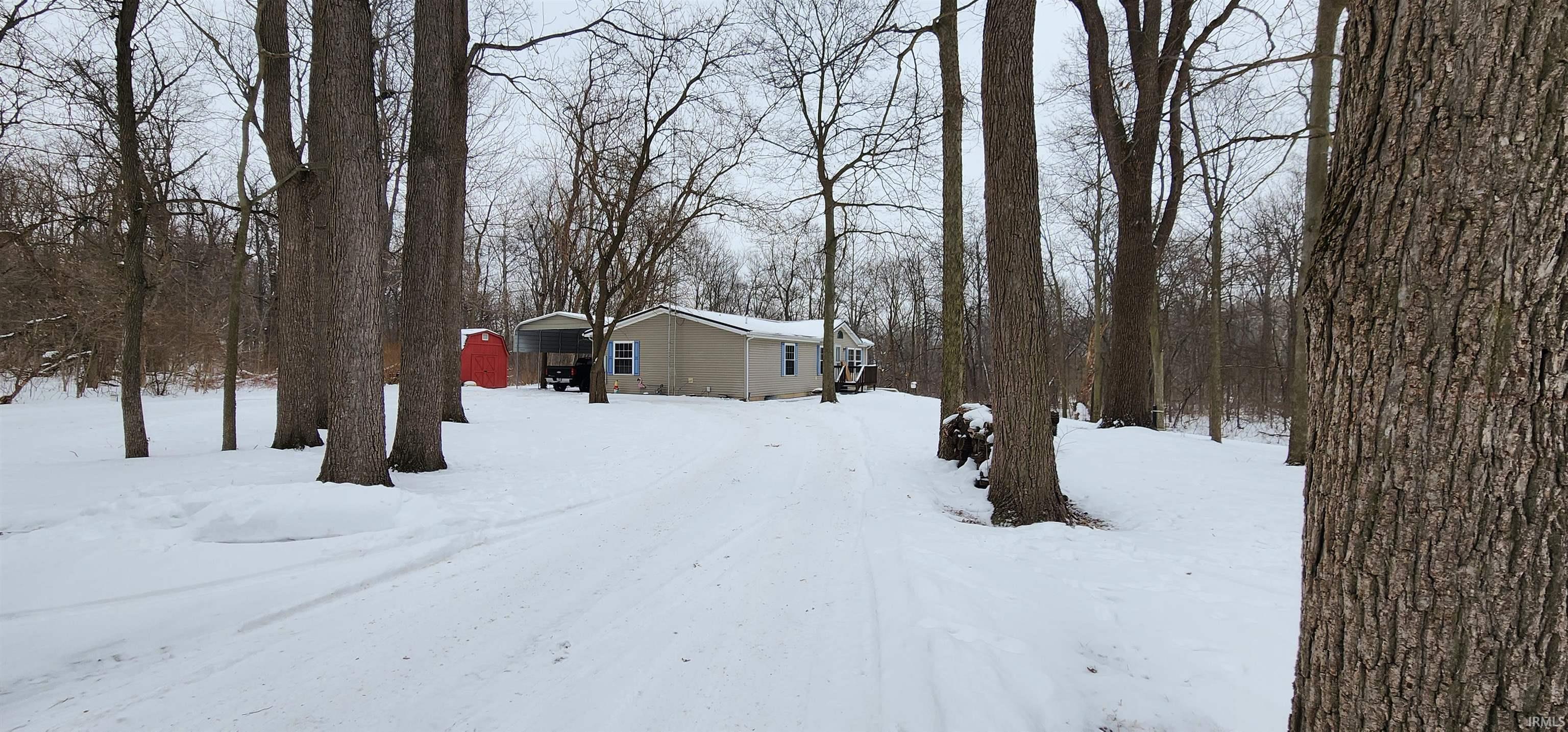 Front of house and car port