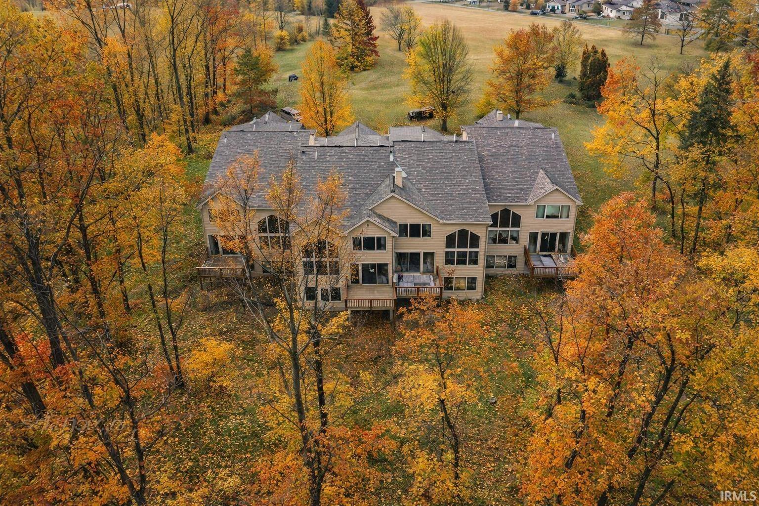 Aerial view of property and surrounding area