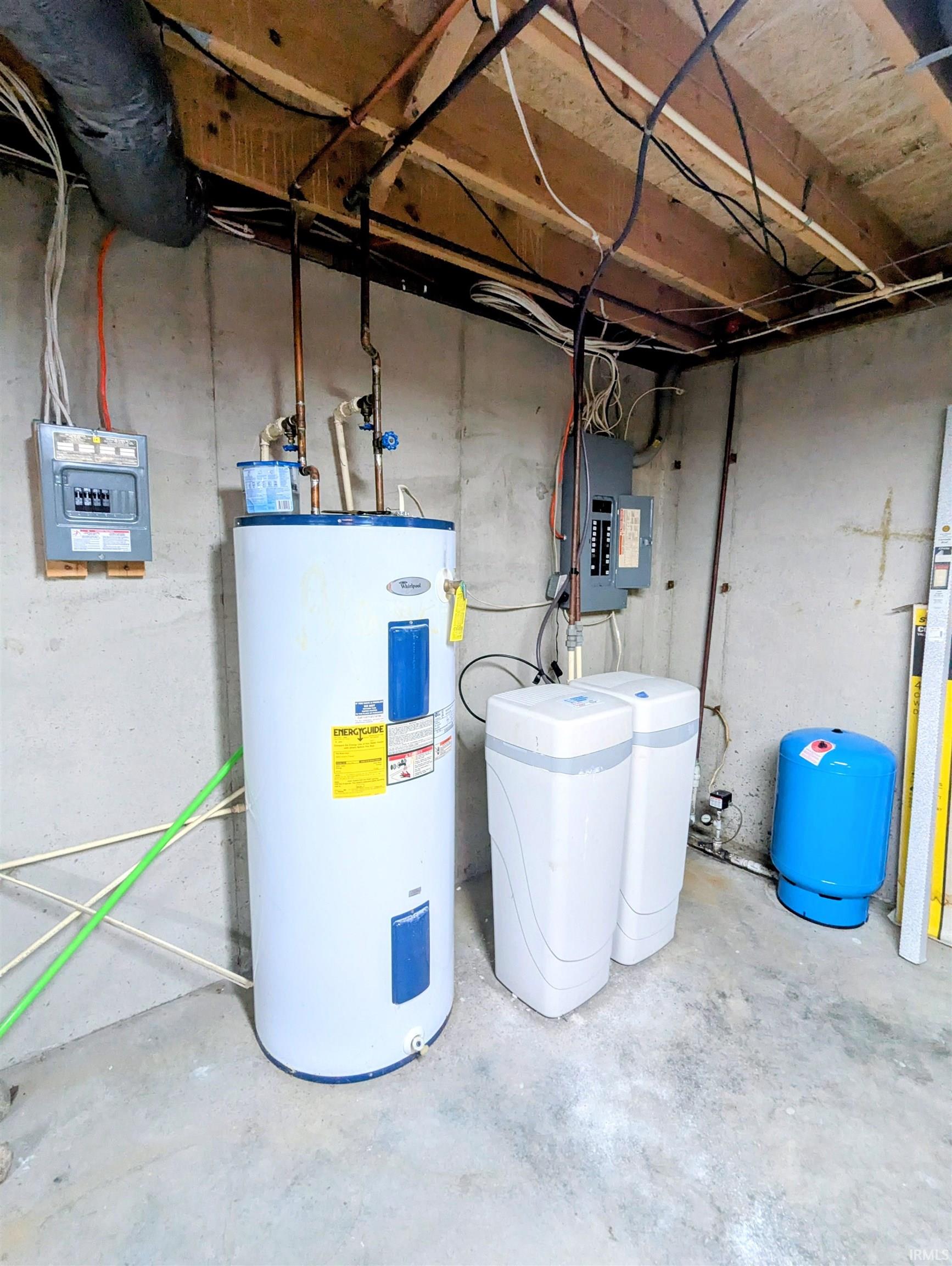 Utilities featuring water heater water softener and electric panel