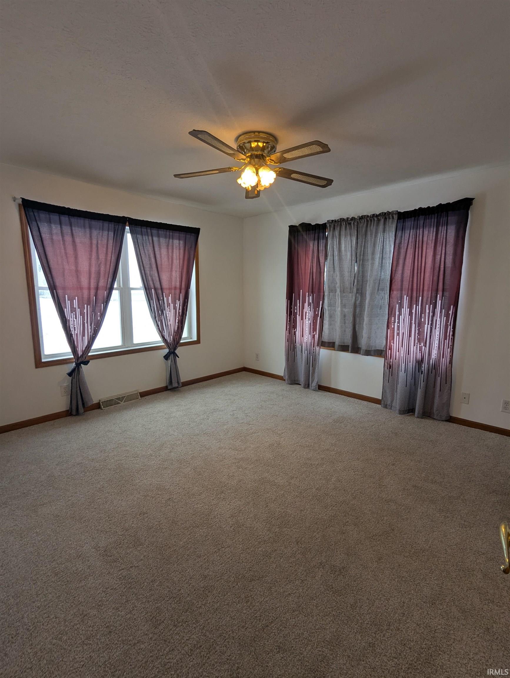 Carpeted Master bedroom features connected master full bathroom