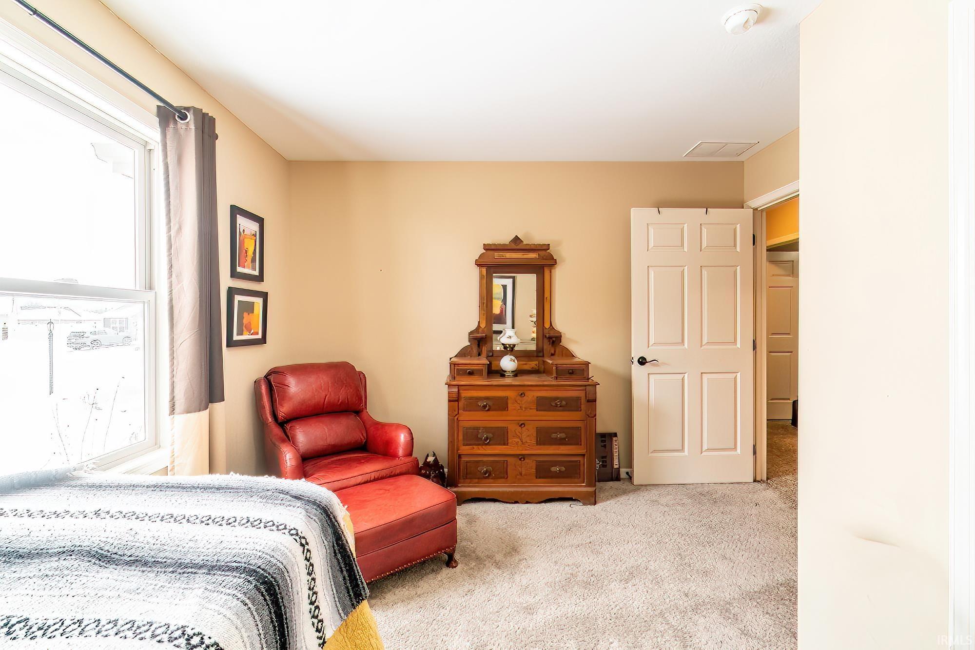 Bedroom with carpet