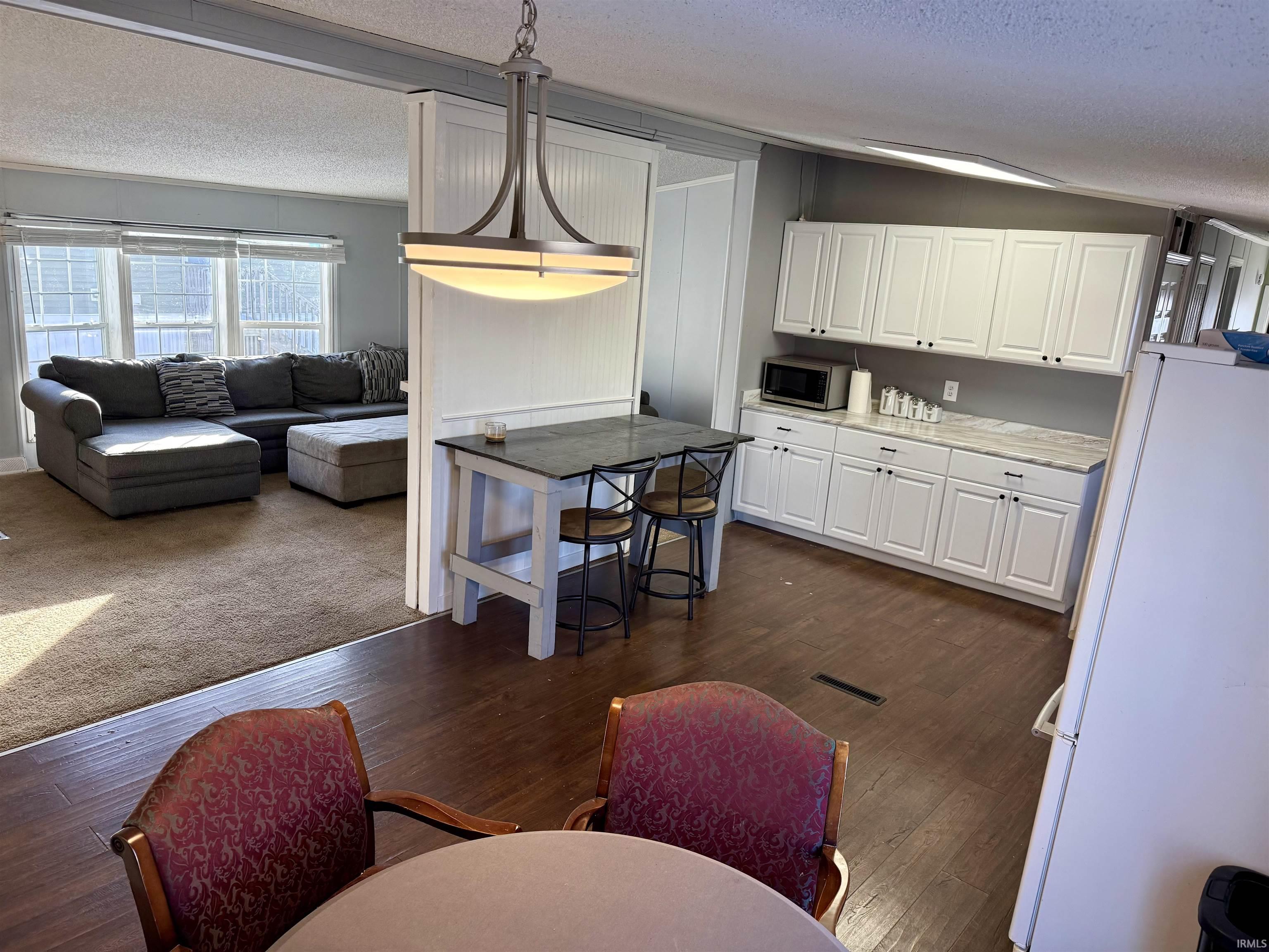 Eating area looking into living room
