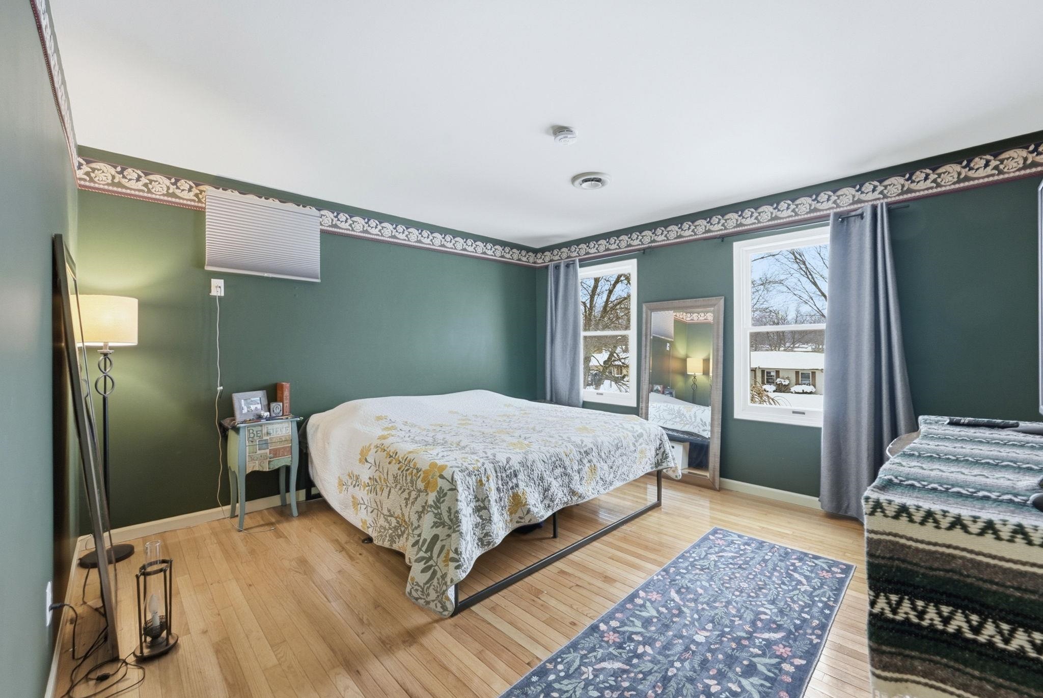 Bedroom featuring light wood-type flooring