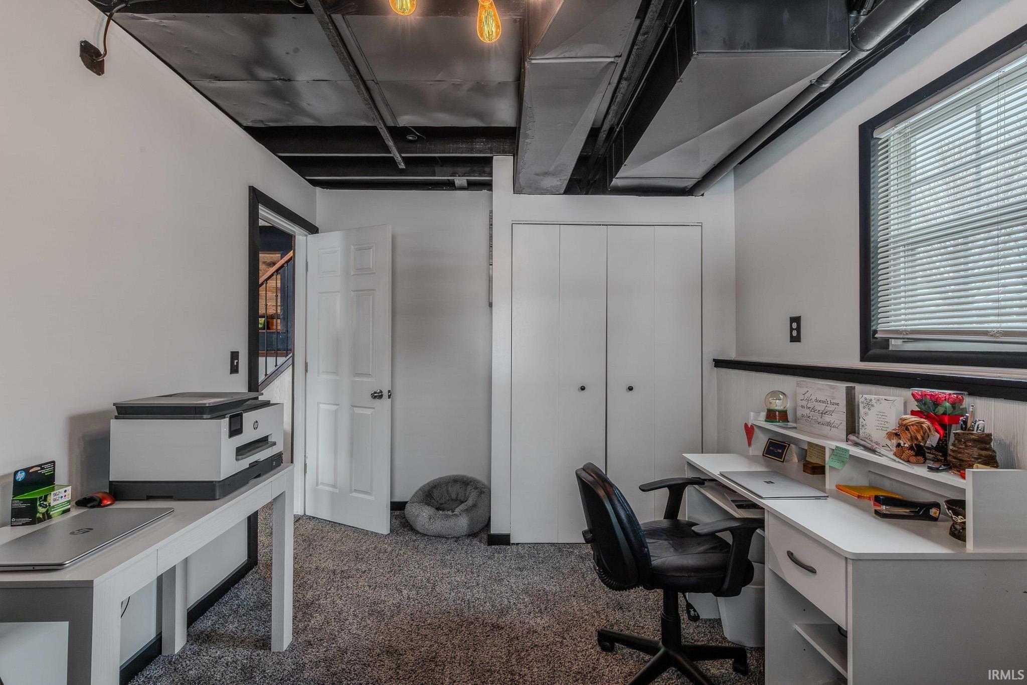 Office space with dark carpet