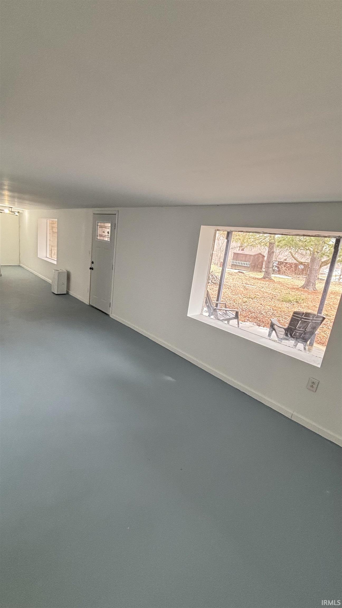 Empty room with baseboards