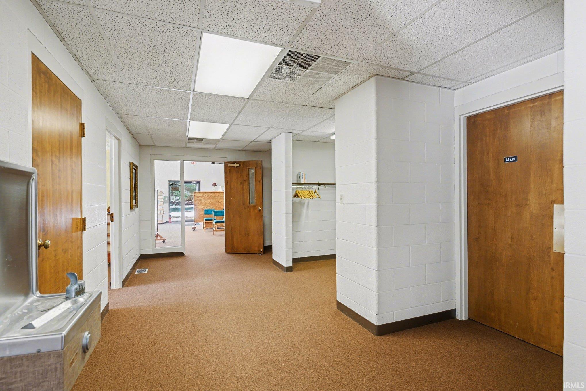 Miscellaneous room featuring a drop ceiling