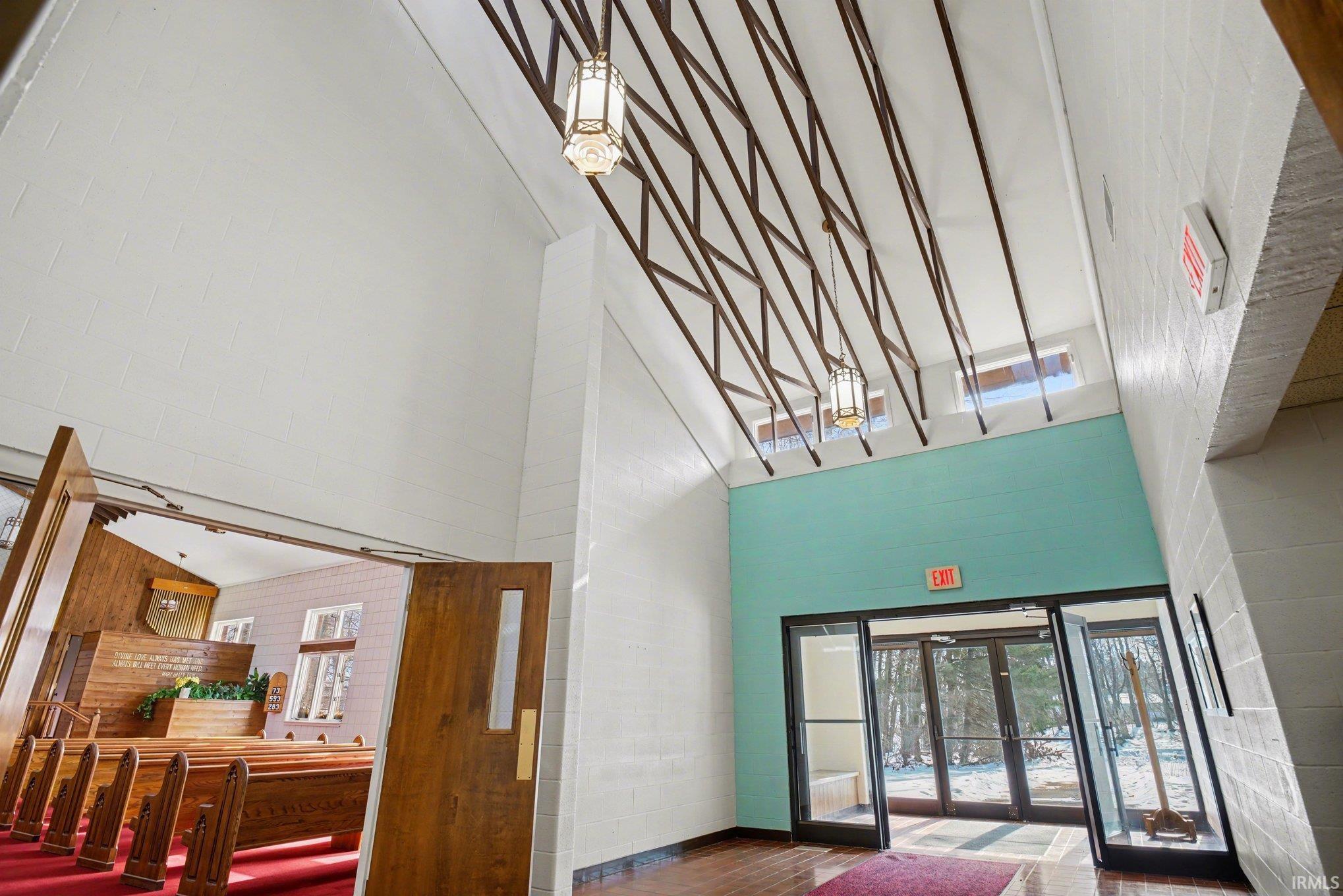 Common area with a high ceiling