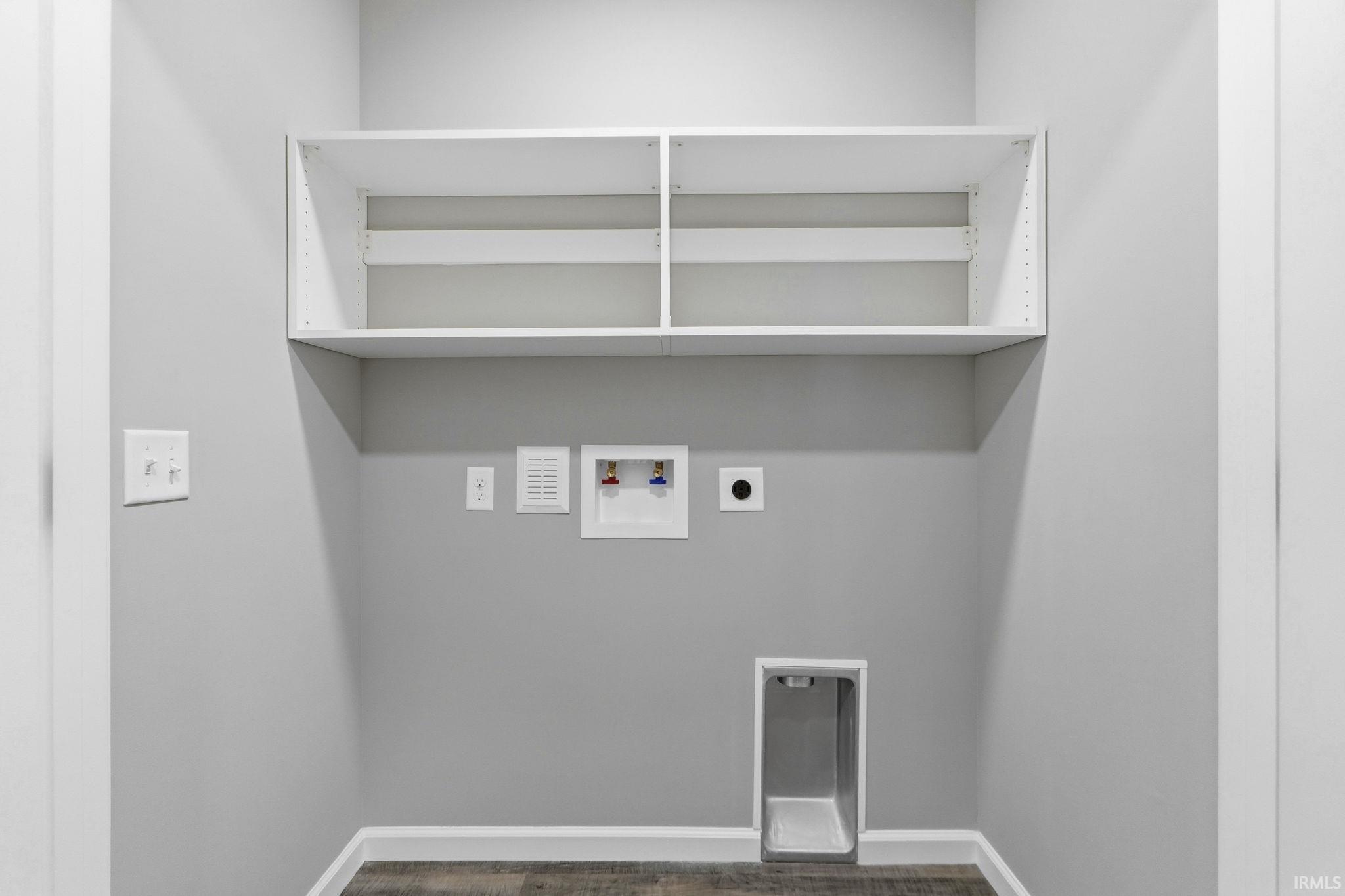 Laundry area featuring hookup for a washing machine and electric dryer hookup