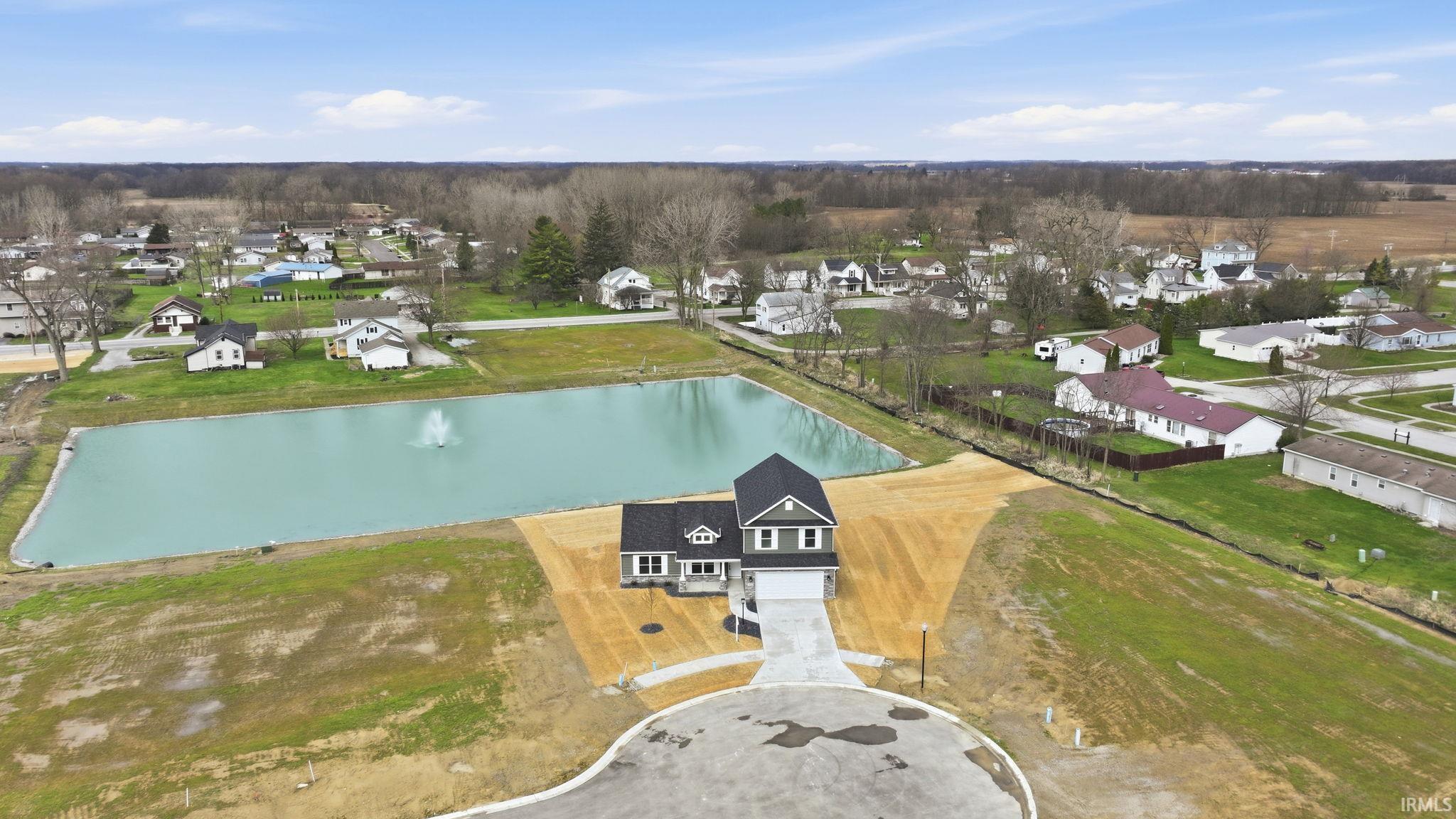 Aerial view of residential area with a nearby body of water
