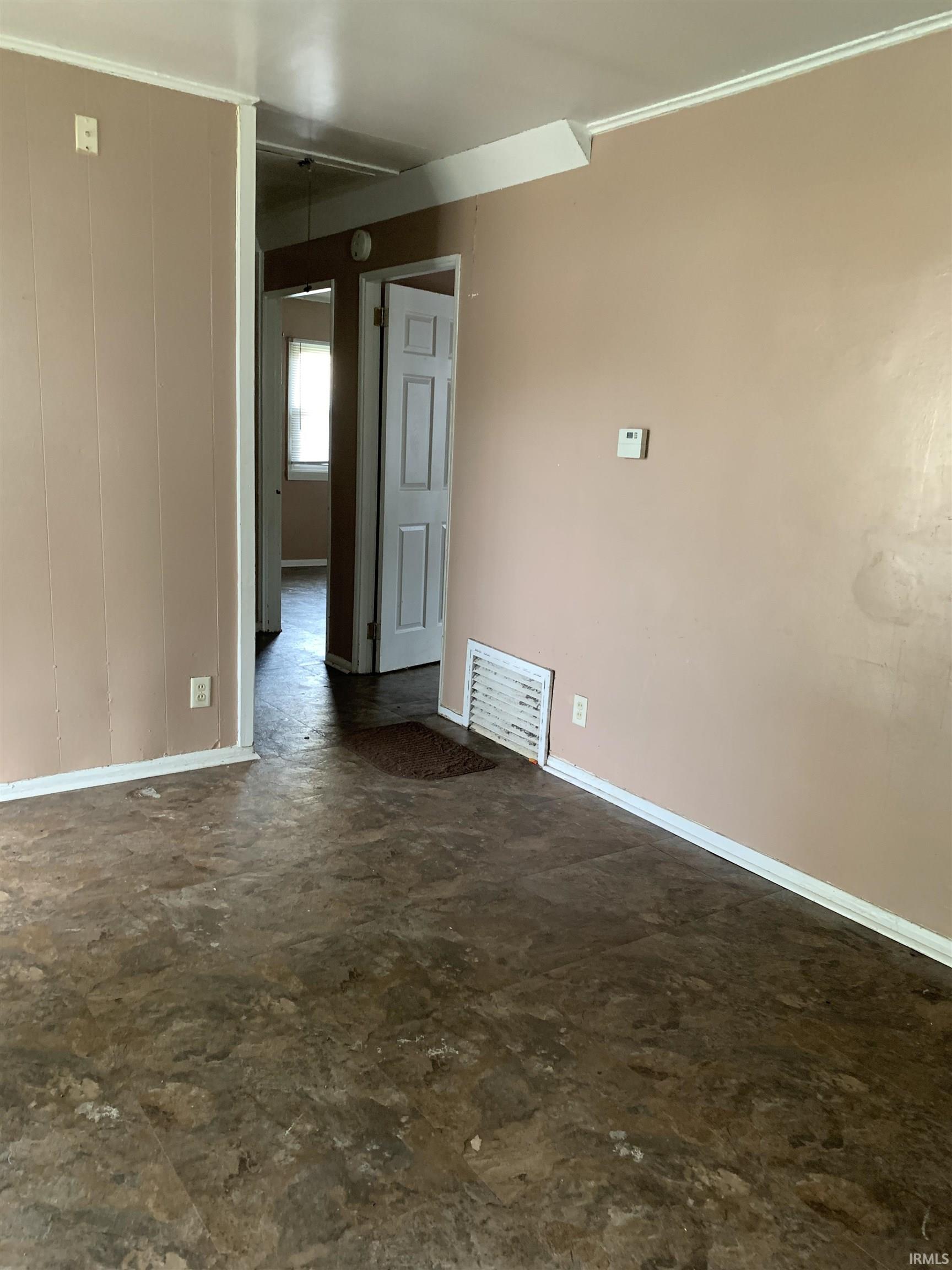 Empty room with baseboards