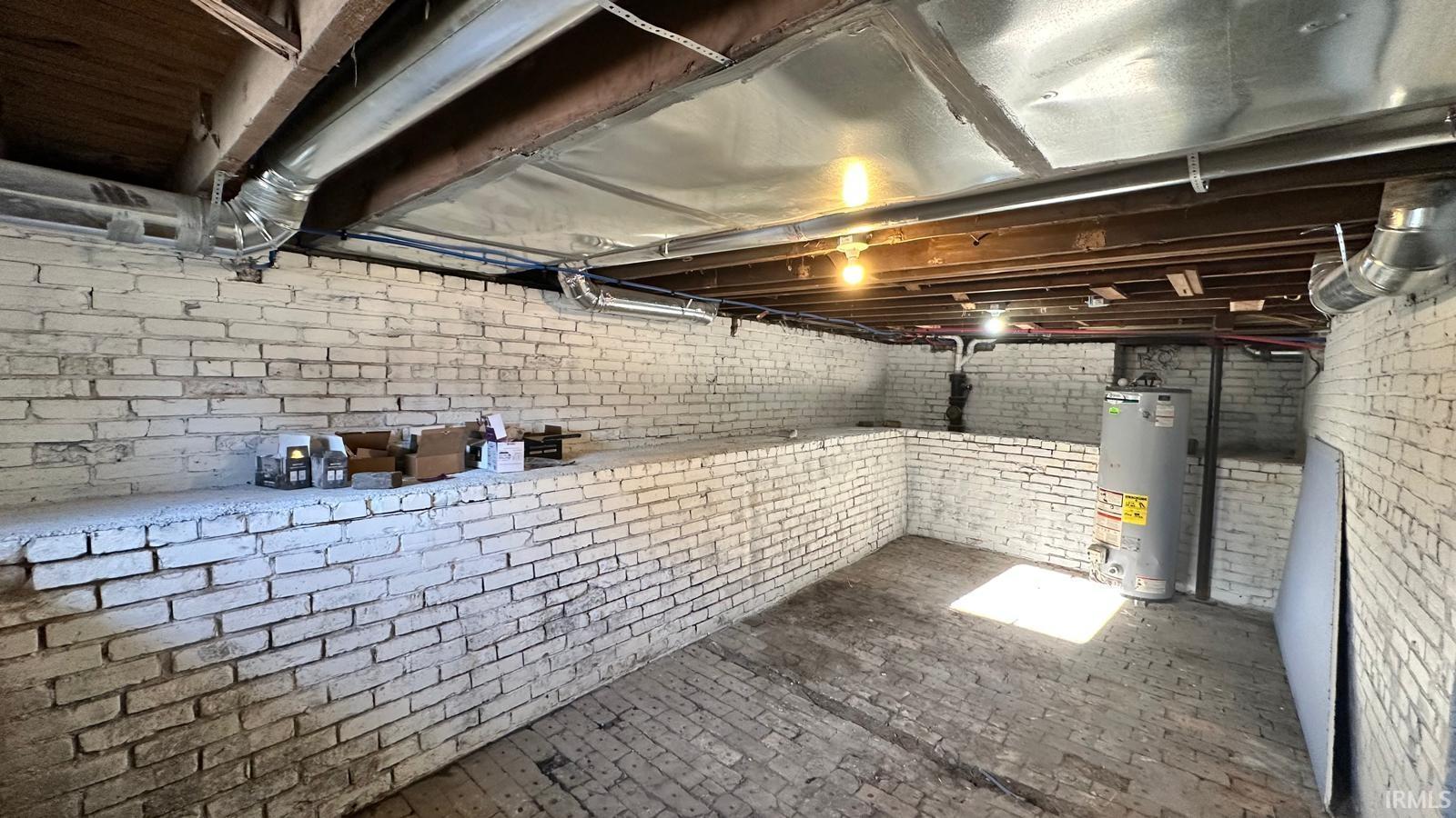 Unfinished basement with water heater