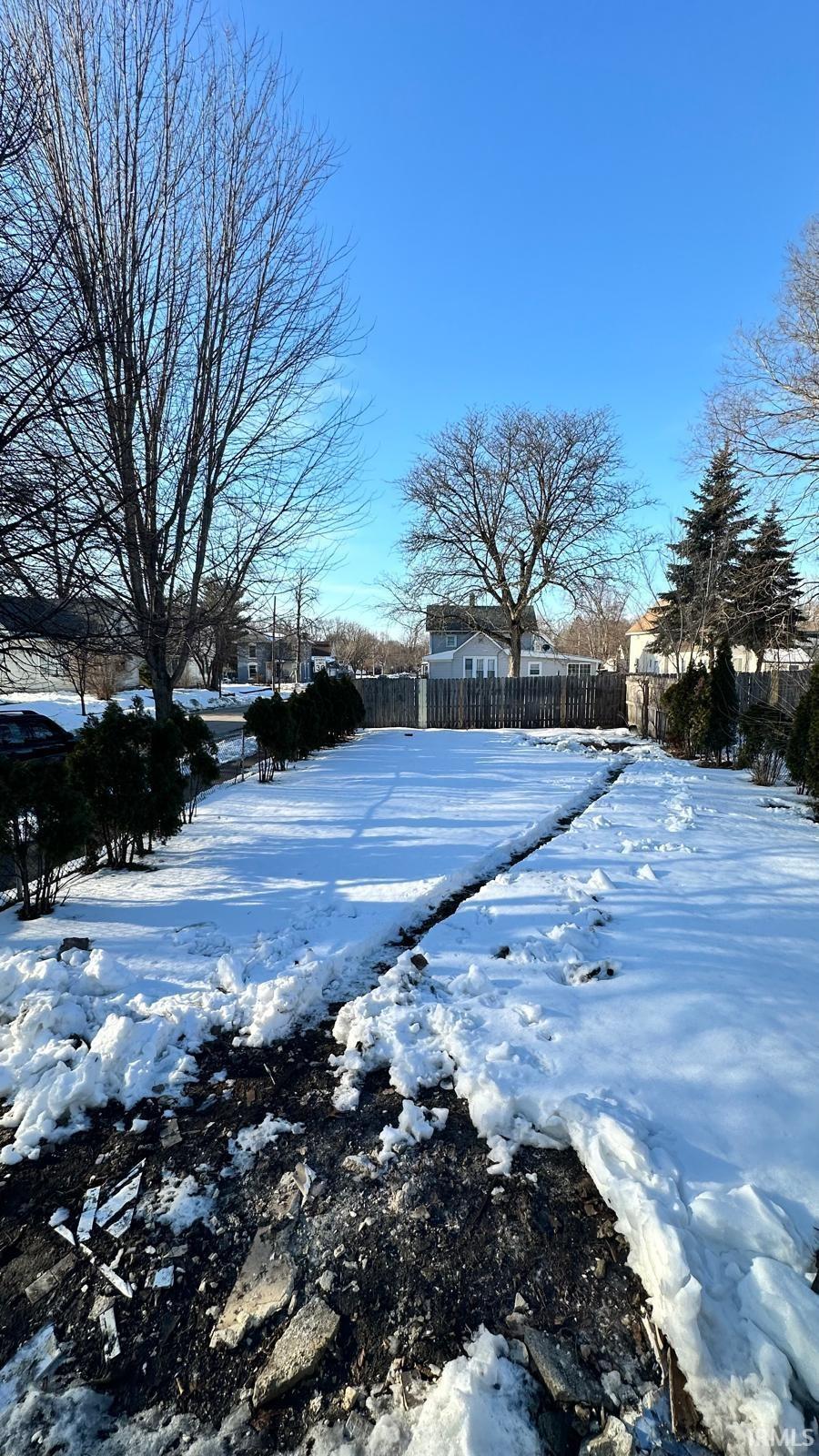 View of snow covered backyard