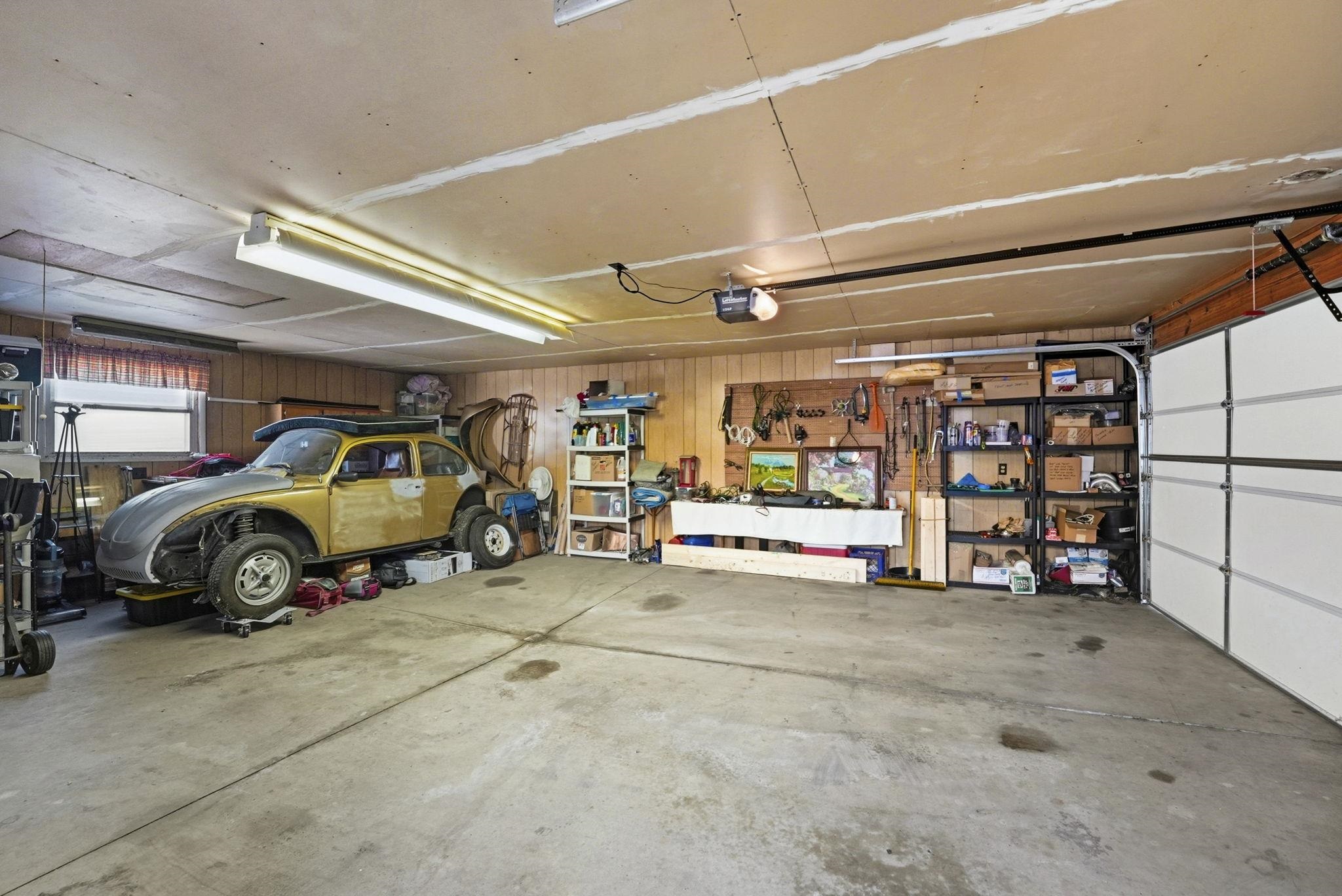 Garage featuring a garage door opener