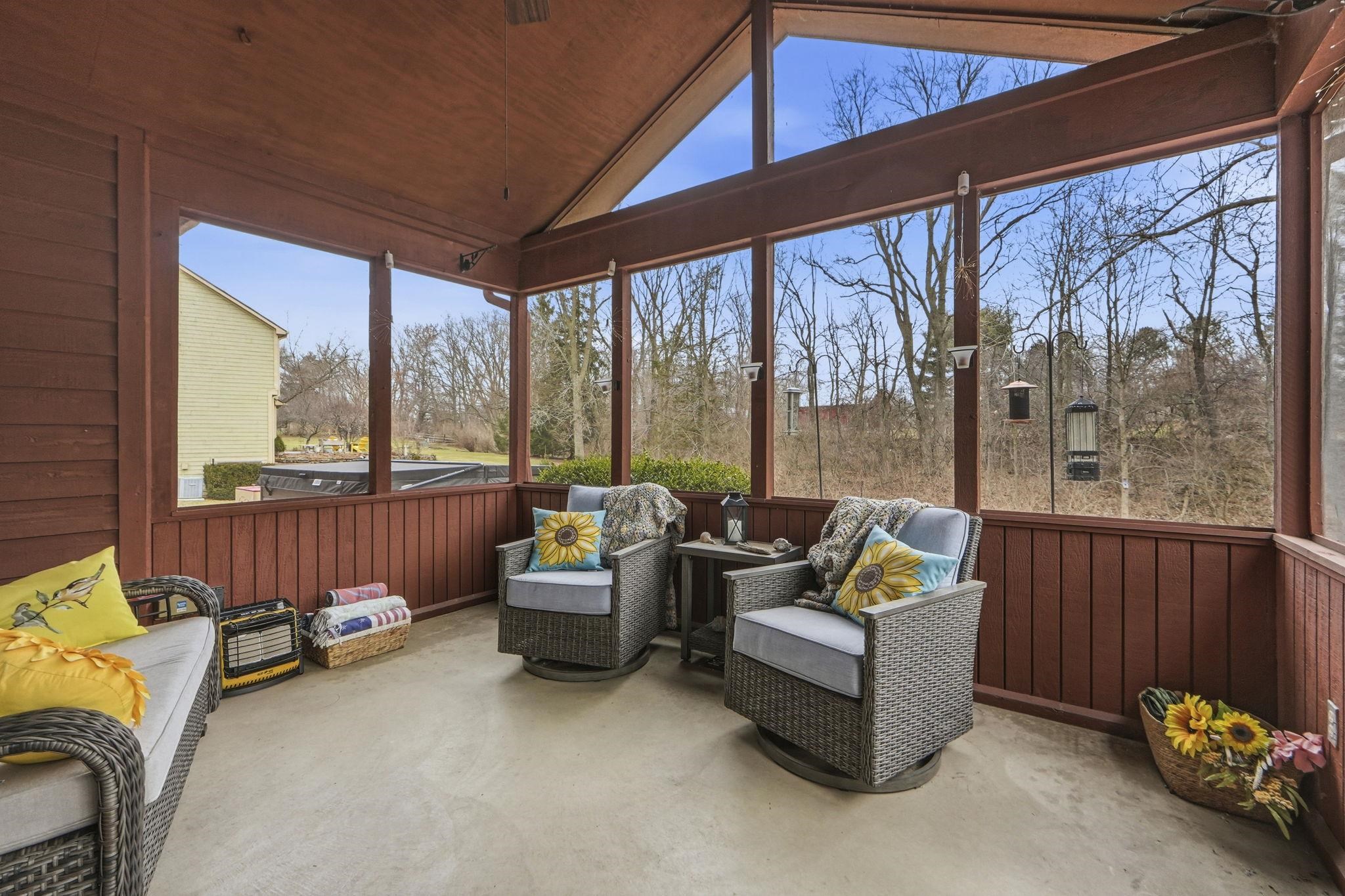 Three seasons room off kitchen.