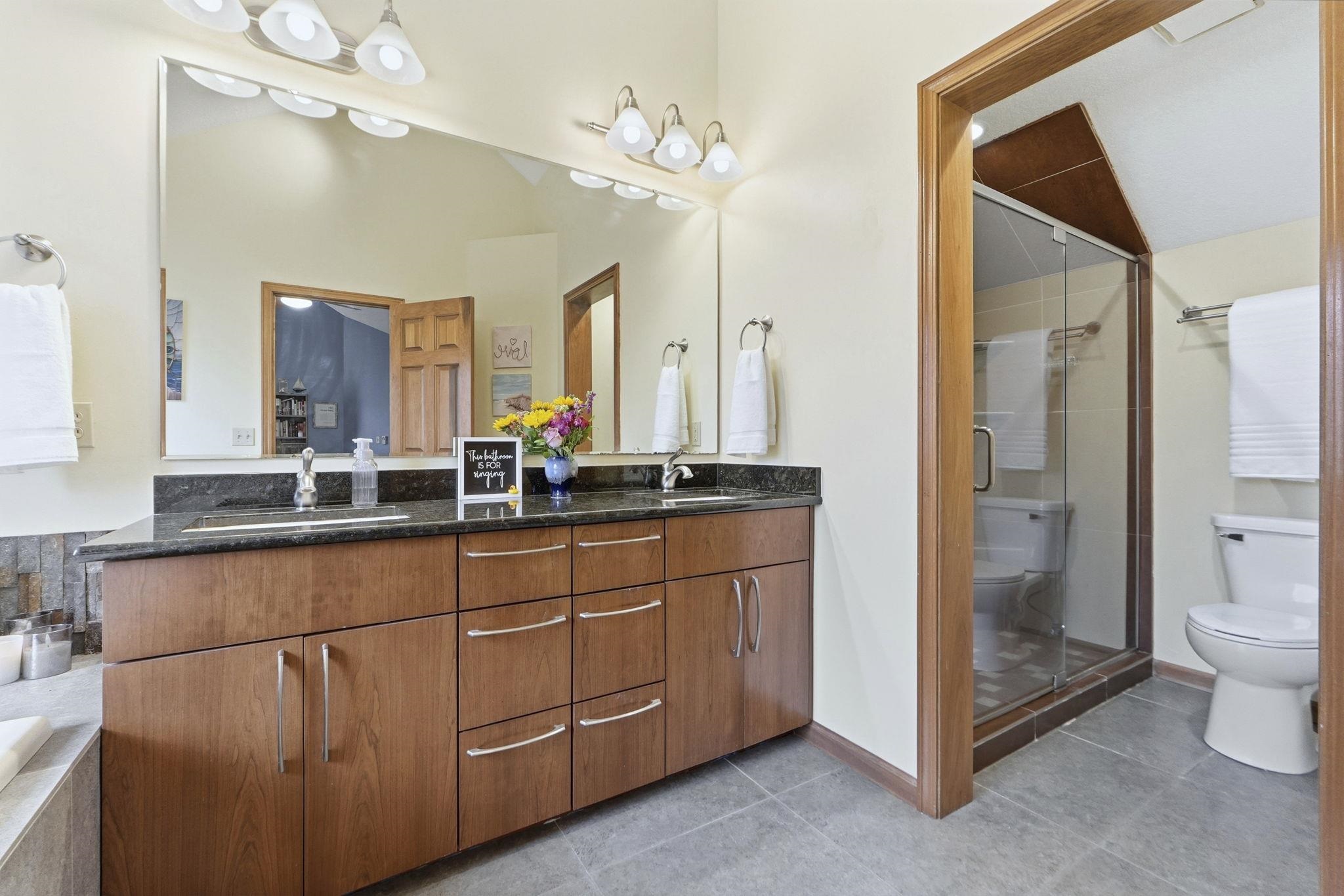 Primary bath with walk in shower and VERY large soaking jet tub!