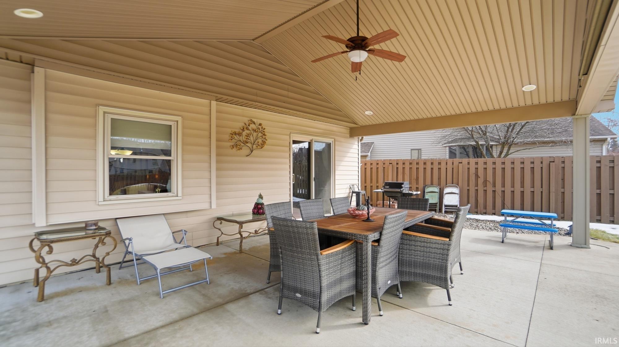 View of patio / terrace featuring a ceiling fan and outdoor dining space