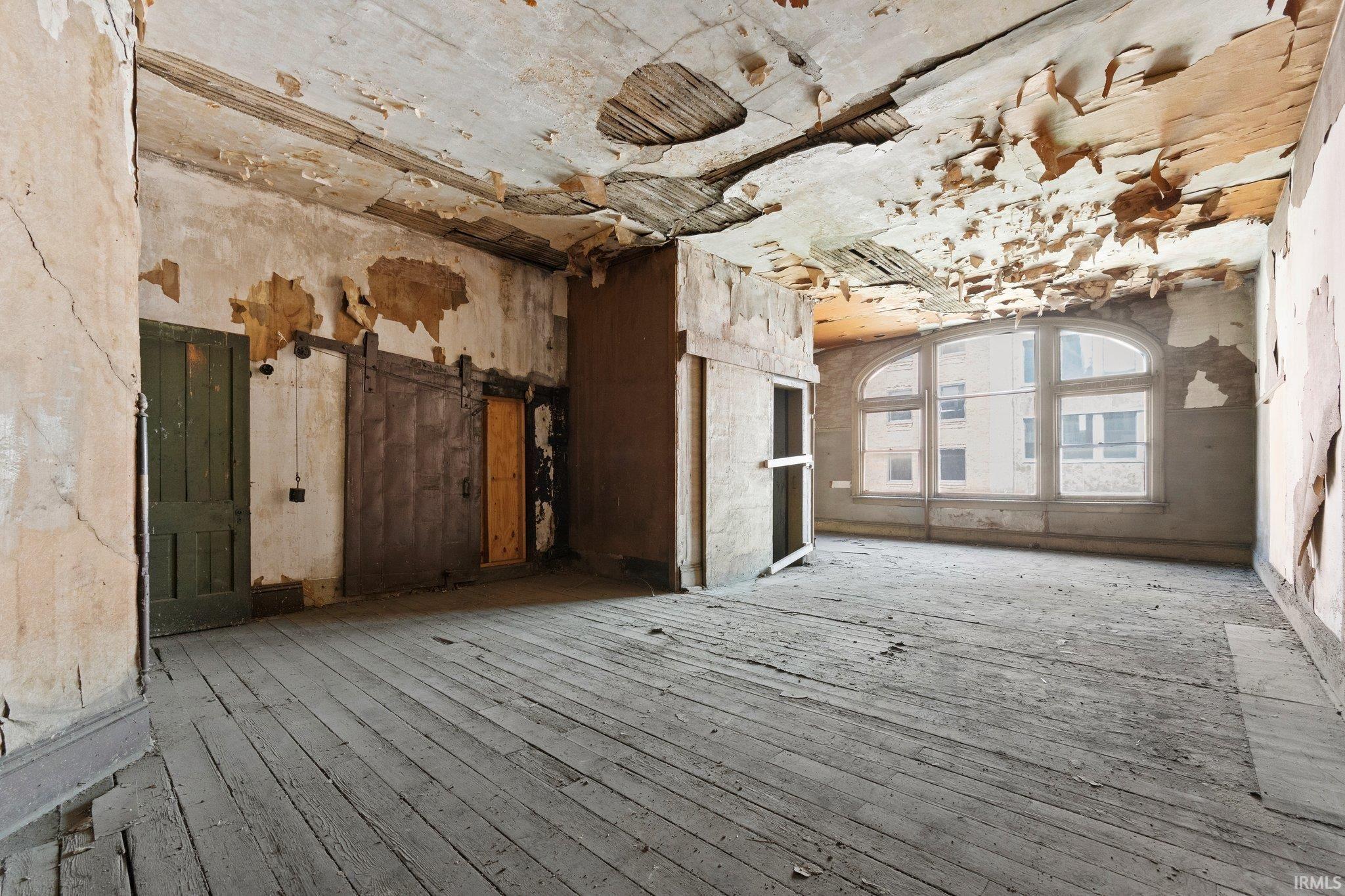 Empty room with wood-type flooring