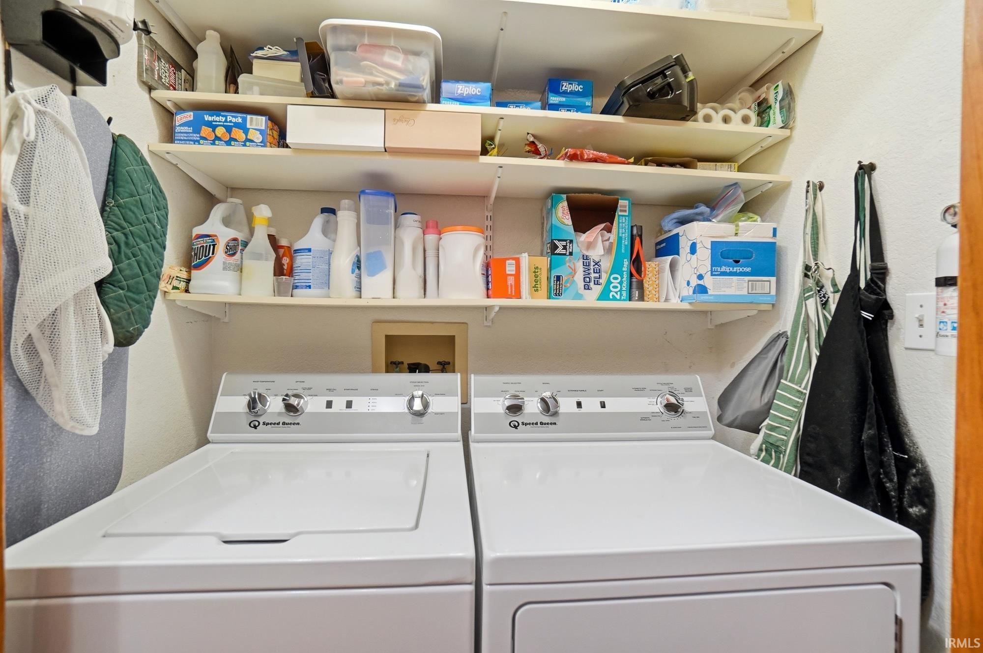 Laundry area featuring washer and clothes dryer