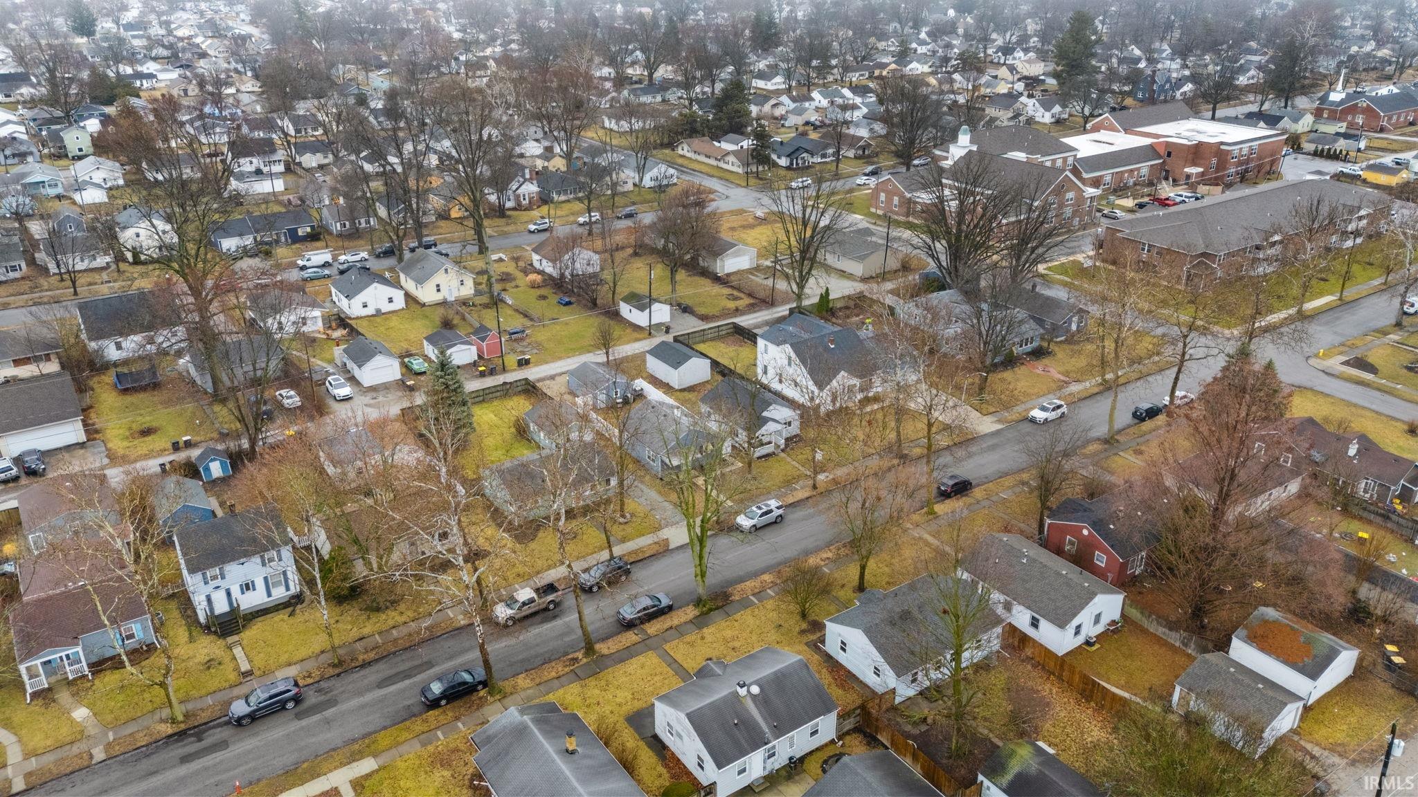 View of property location featuring nearby suburban area