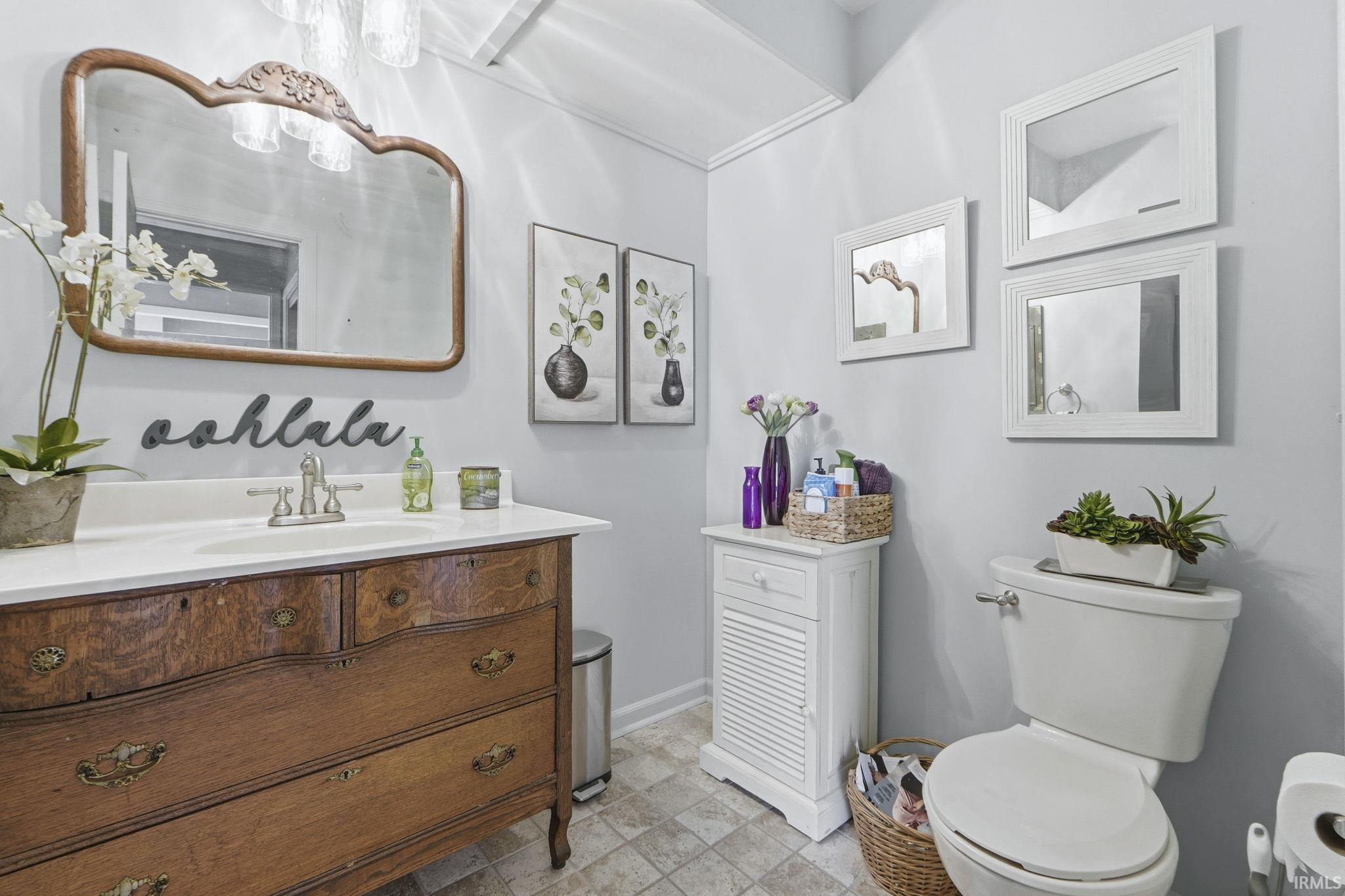 Bathroom with toilet and vanity