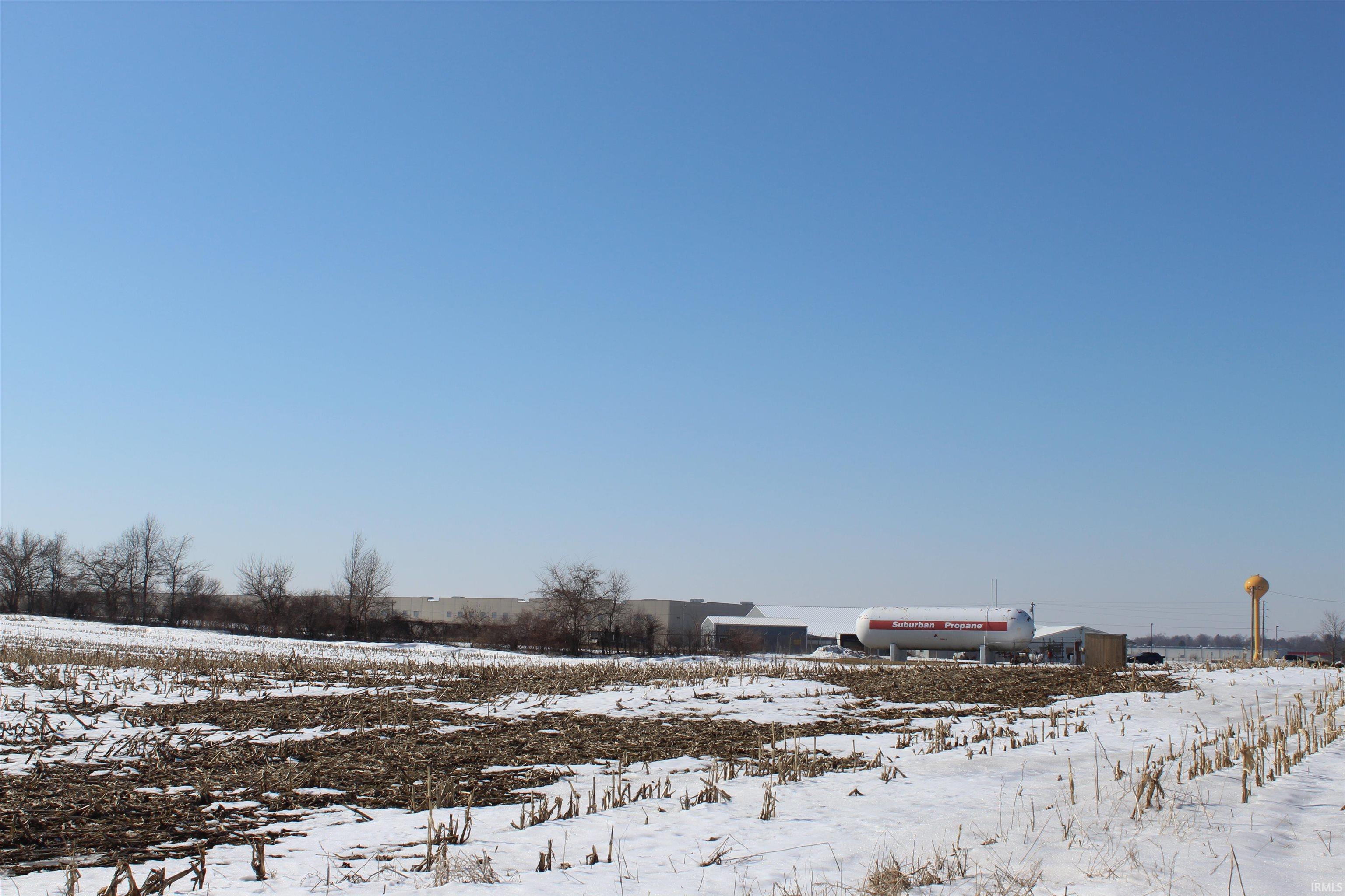 View of yard layered in snow