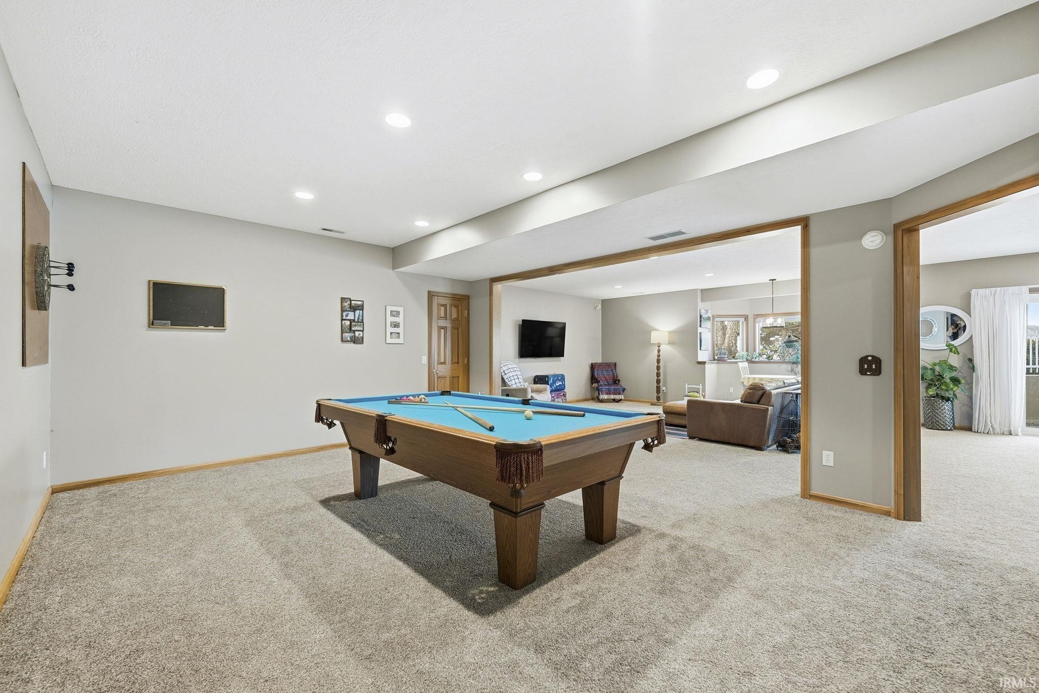 Playroom with recessed lighting, pool table, and light carpet