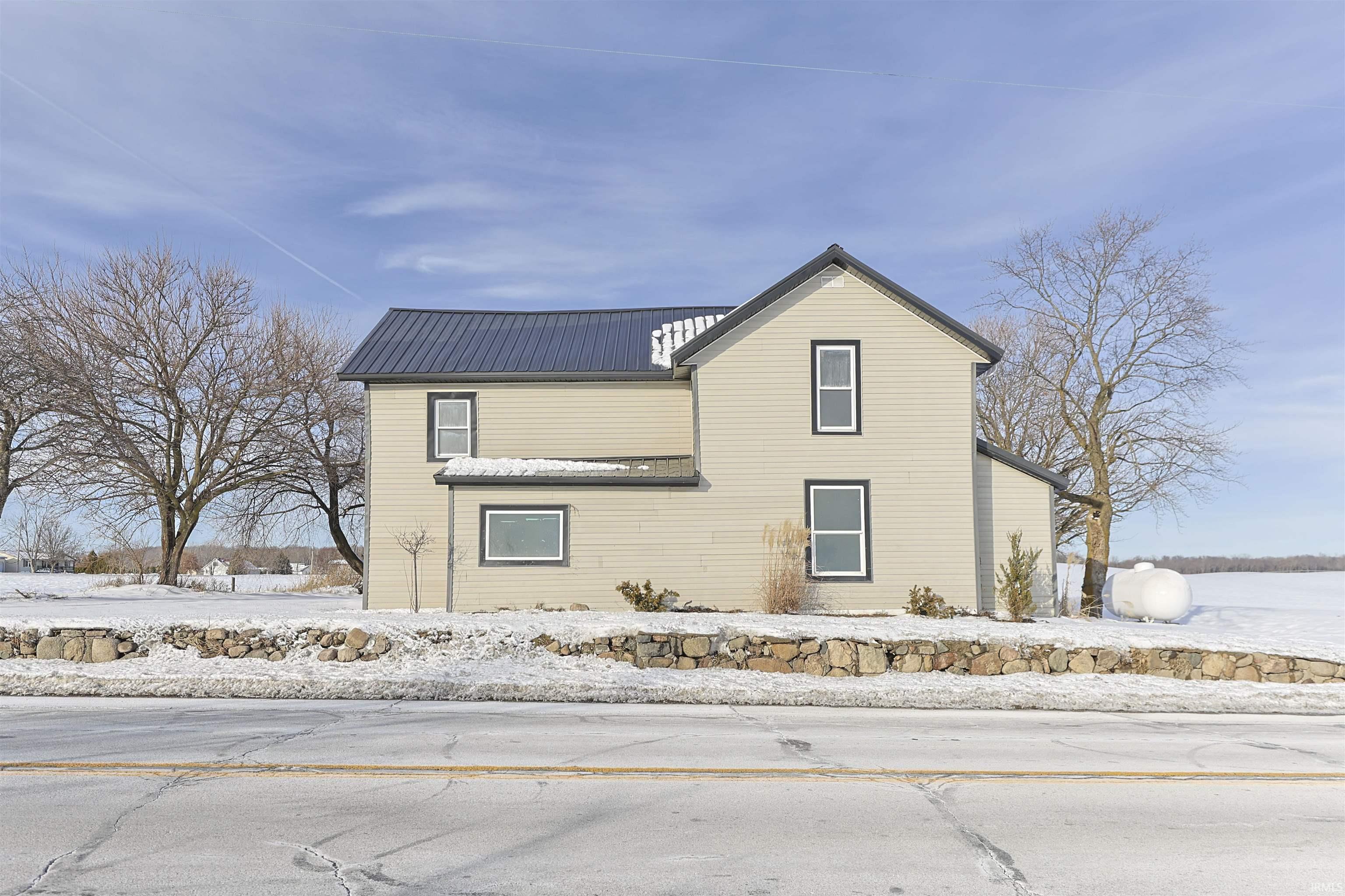 View of front facade with a metal roof