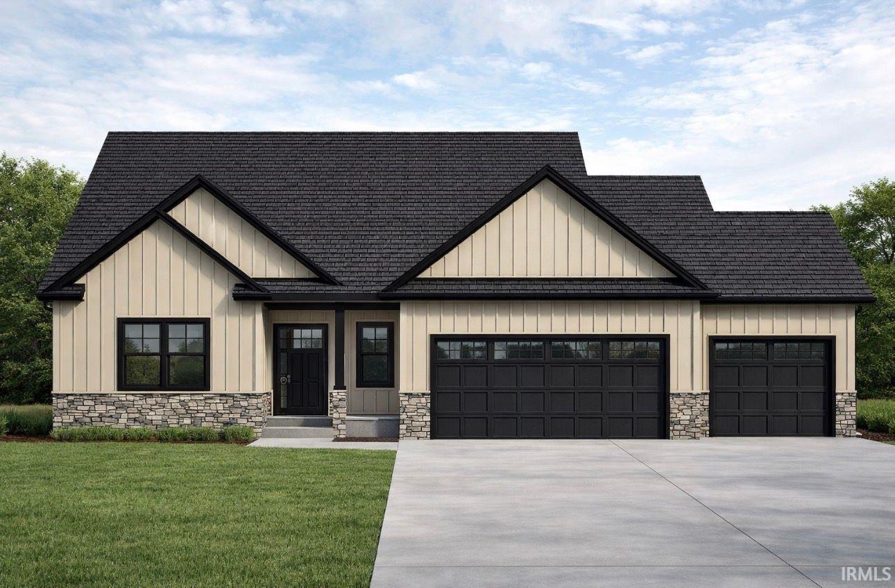 Modern farmhouse style home with board and batten siding, stone siding, driveway, and a garage