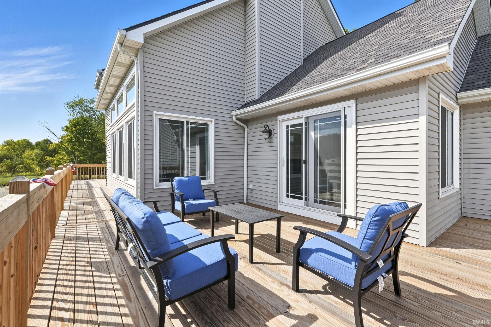 Wooden terrace with an outdoor living space