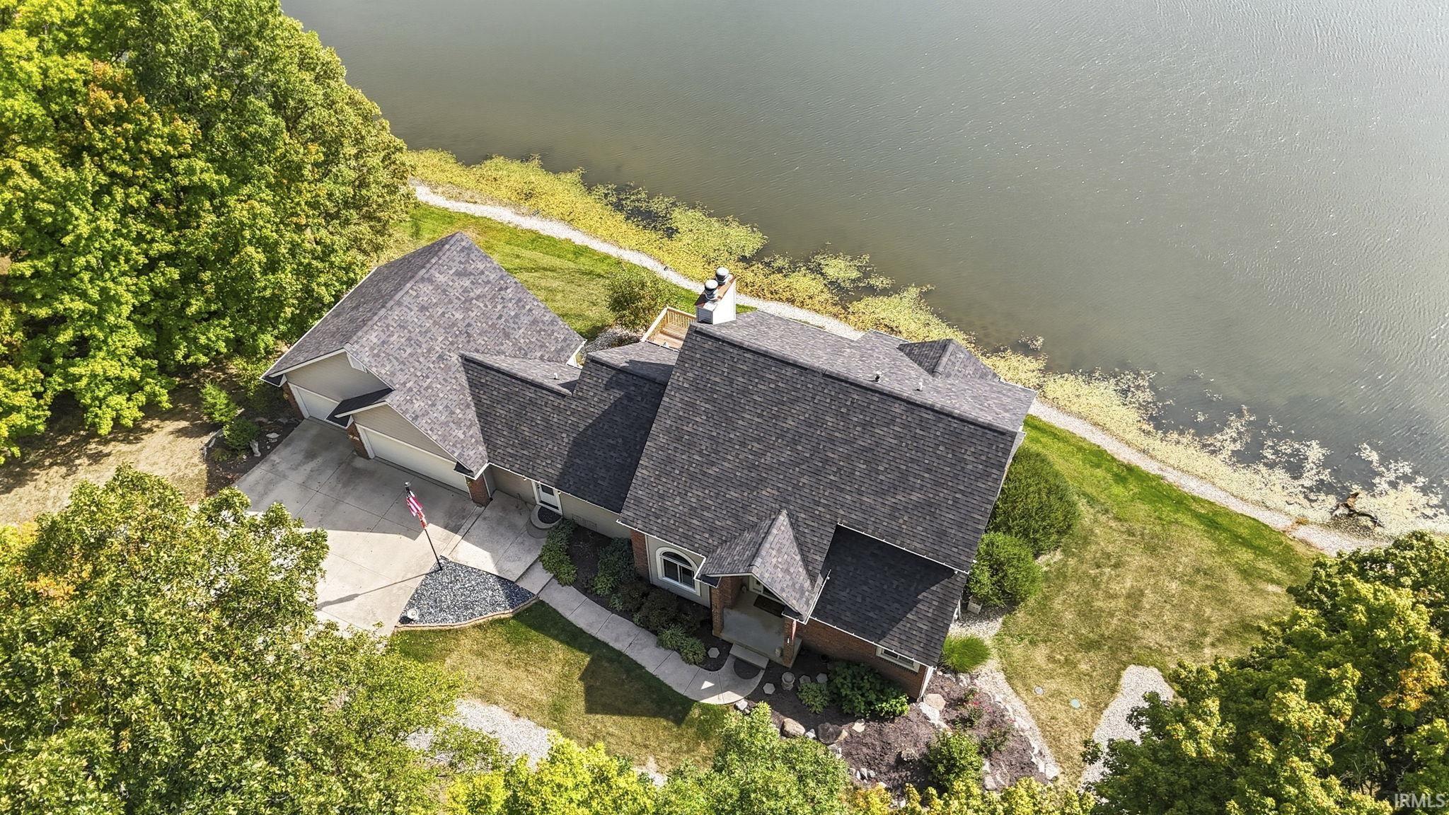 View from above of property with a large body of water