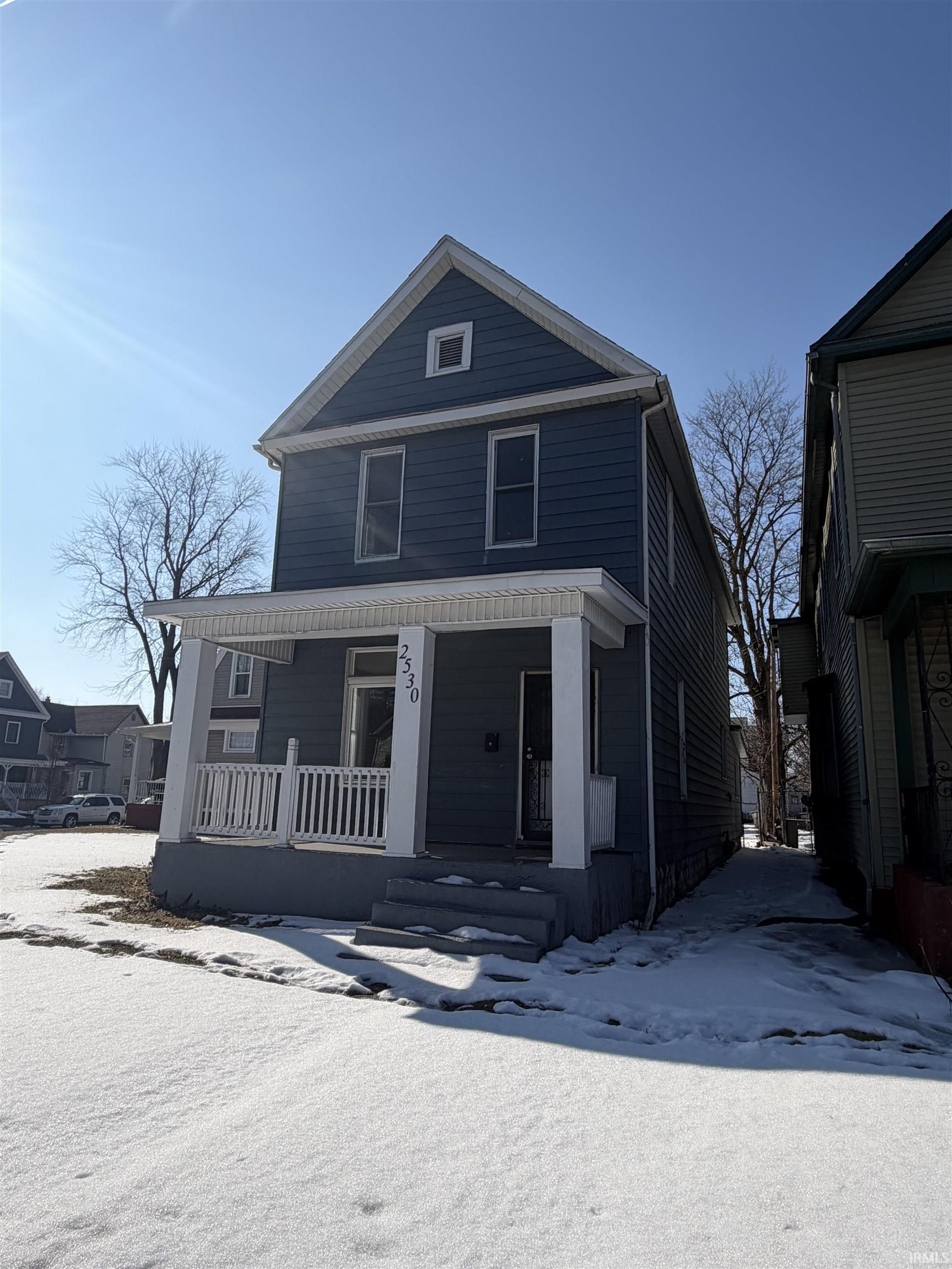 View of front of home featuring a porch