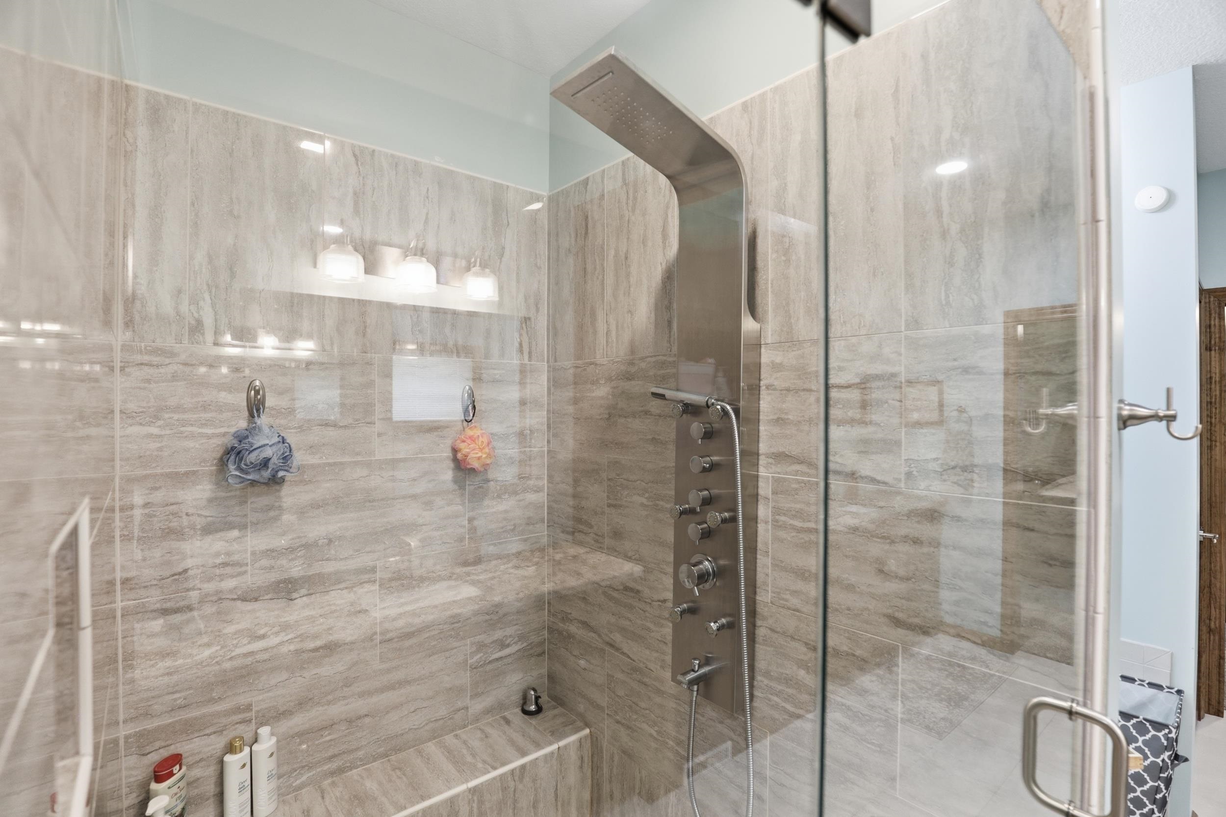 Full bathroom with a stall shower