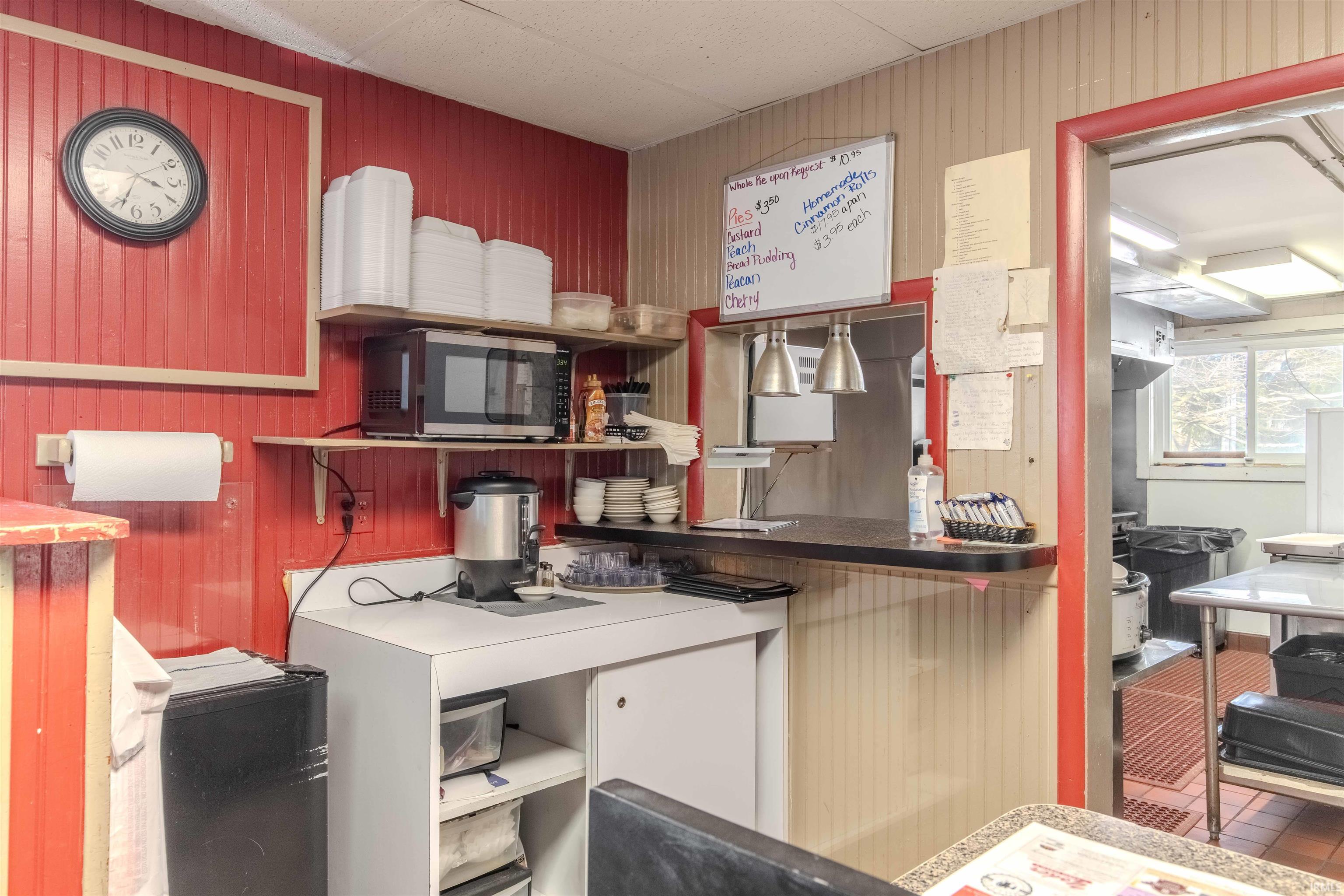 Kitchen featuring stainless steel microwave