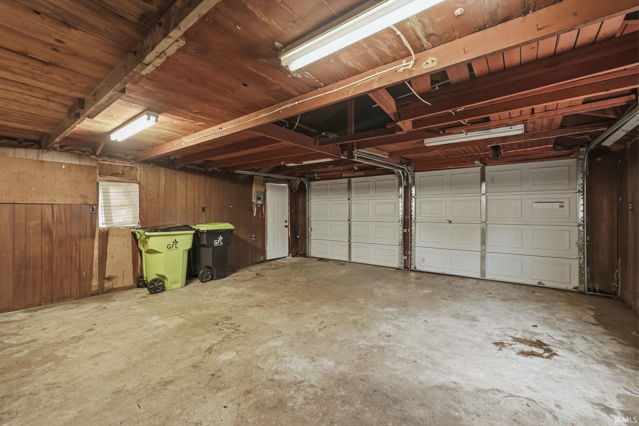 Garage with wooden walls