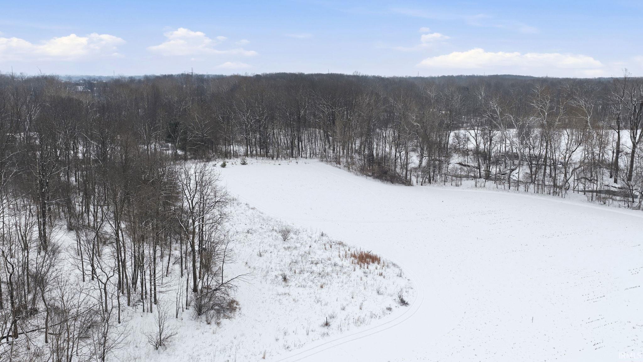 Aerial view of a heavily wooded area
