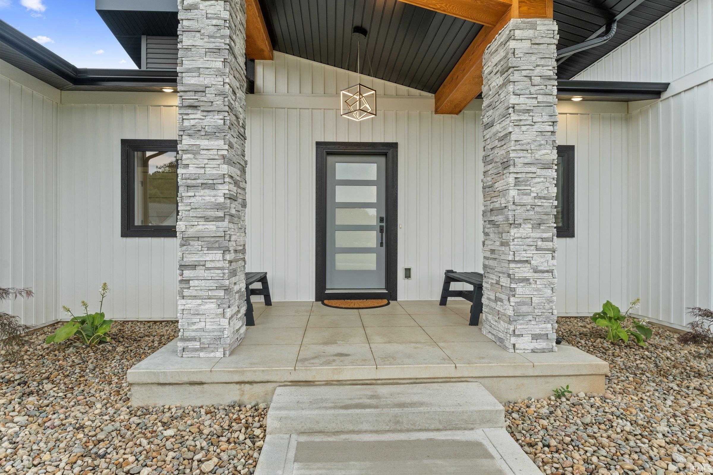 Entrance to property with covered porch