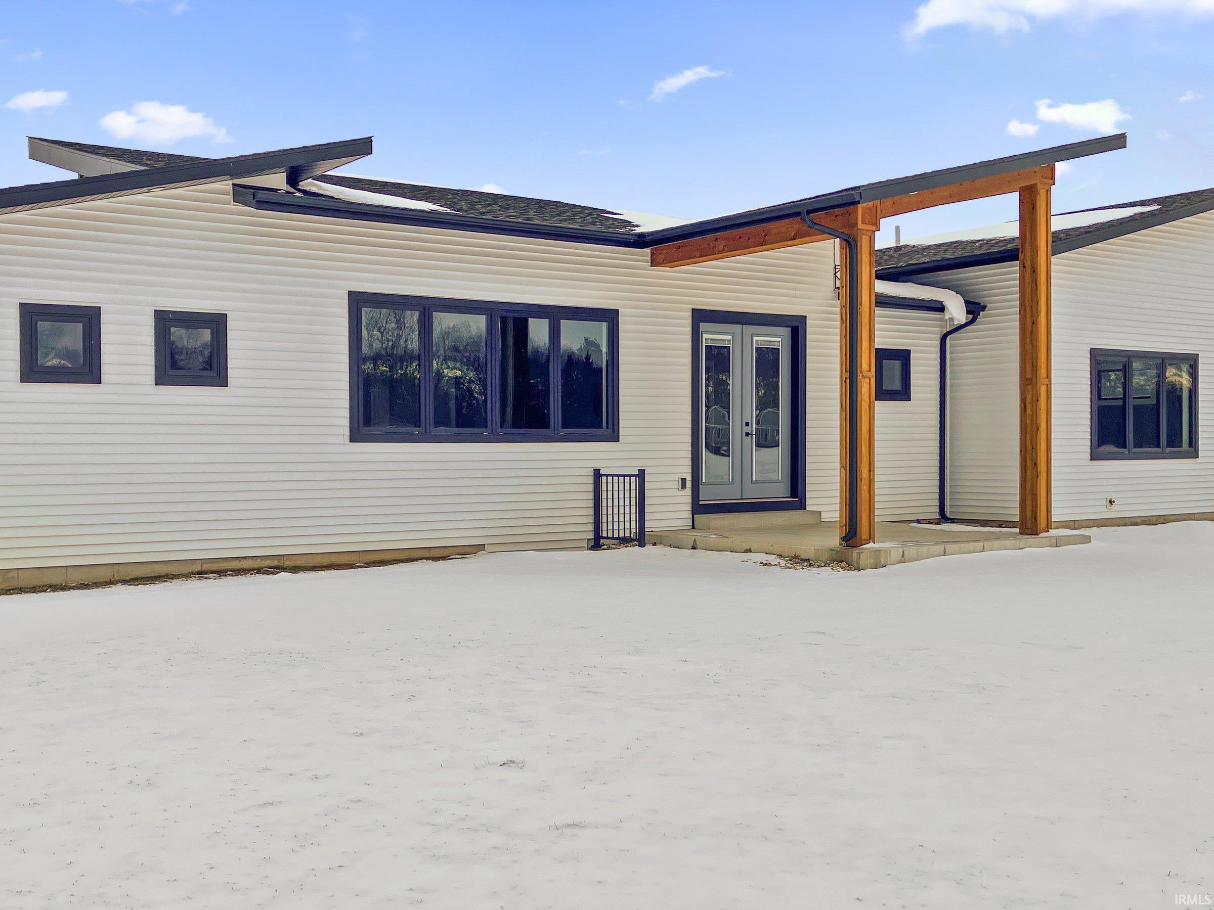 View of front facade featuring french doors