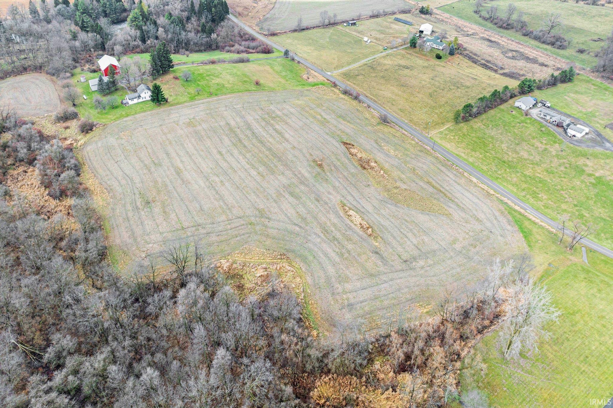 Overview of rural landscape featuring extensive farmland