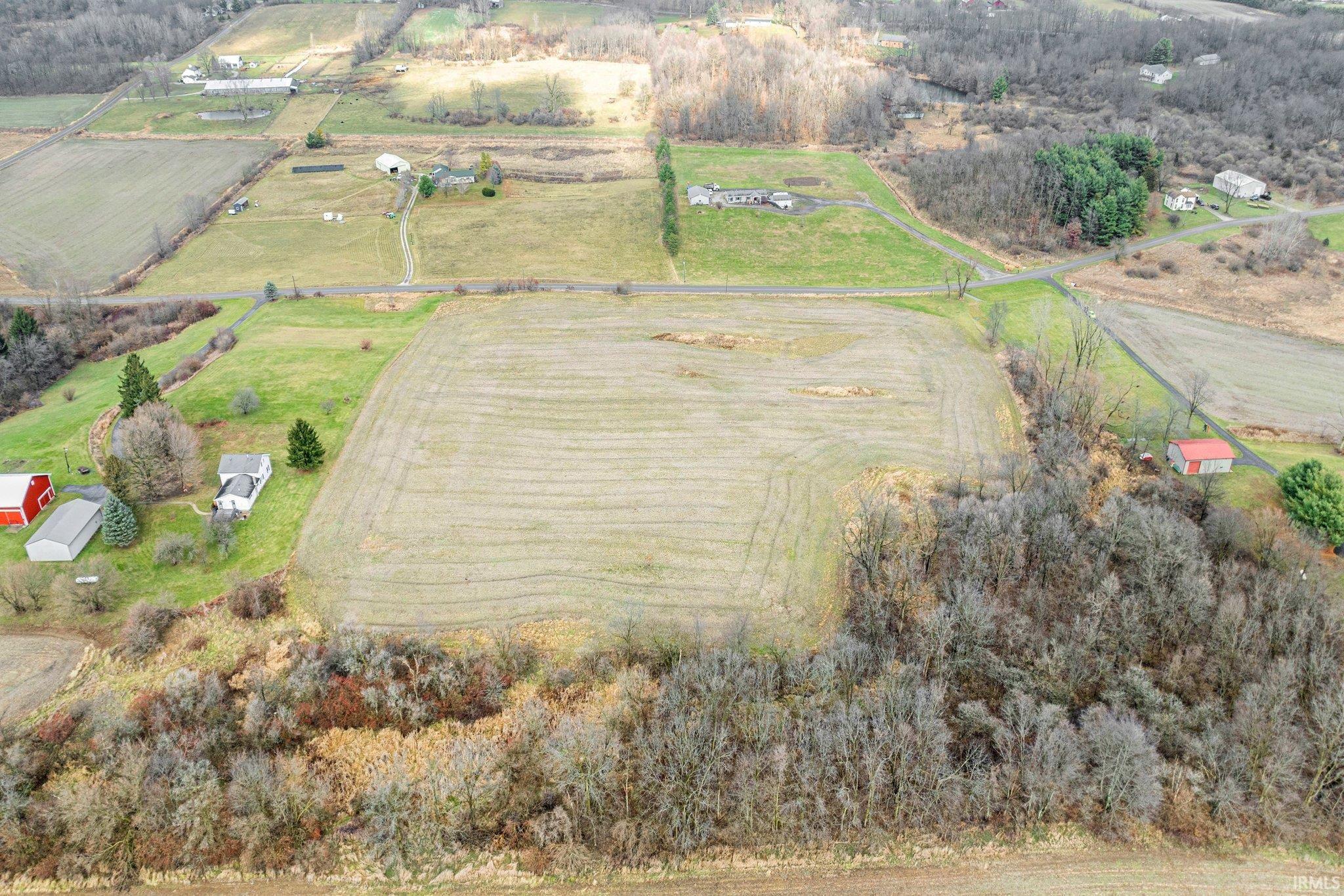 Aerial view of sparsely populated area with abundant farmland