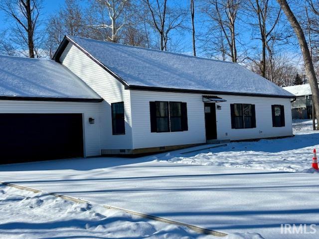 View of front of property with an attached garage
