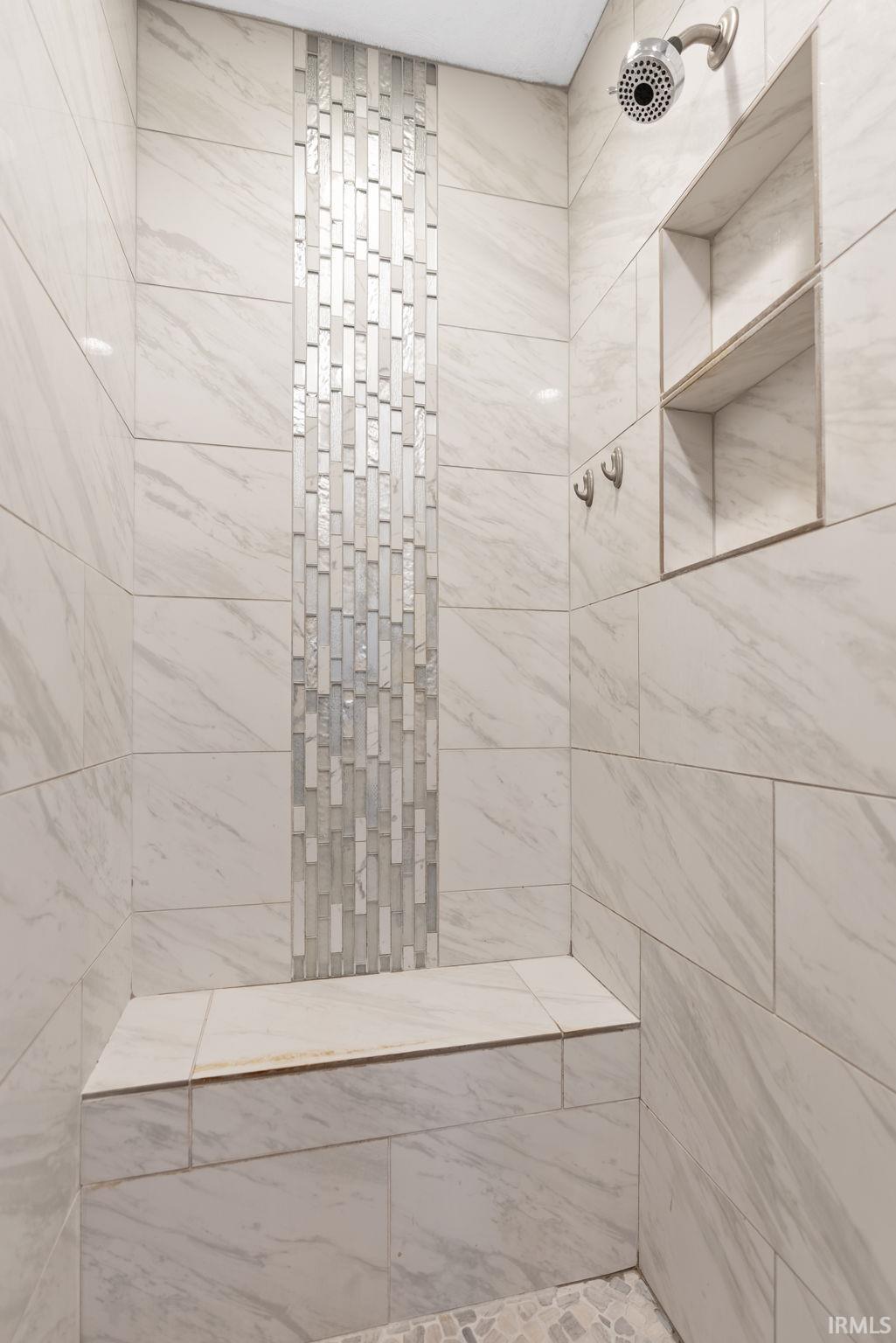 Bathroom with a tile shower