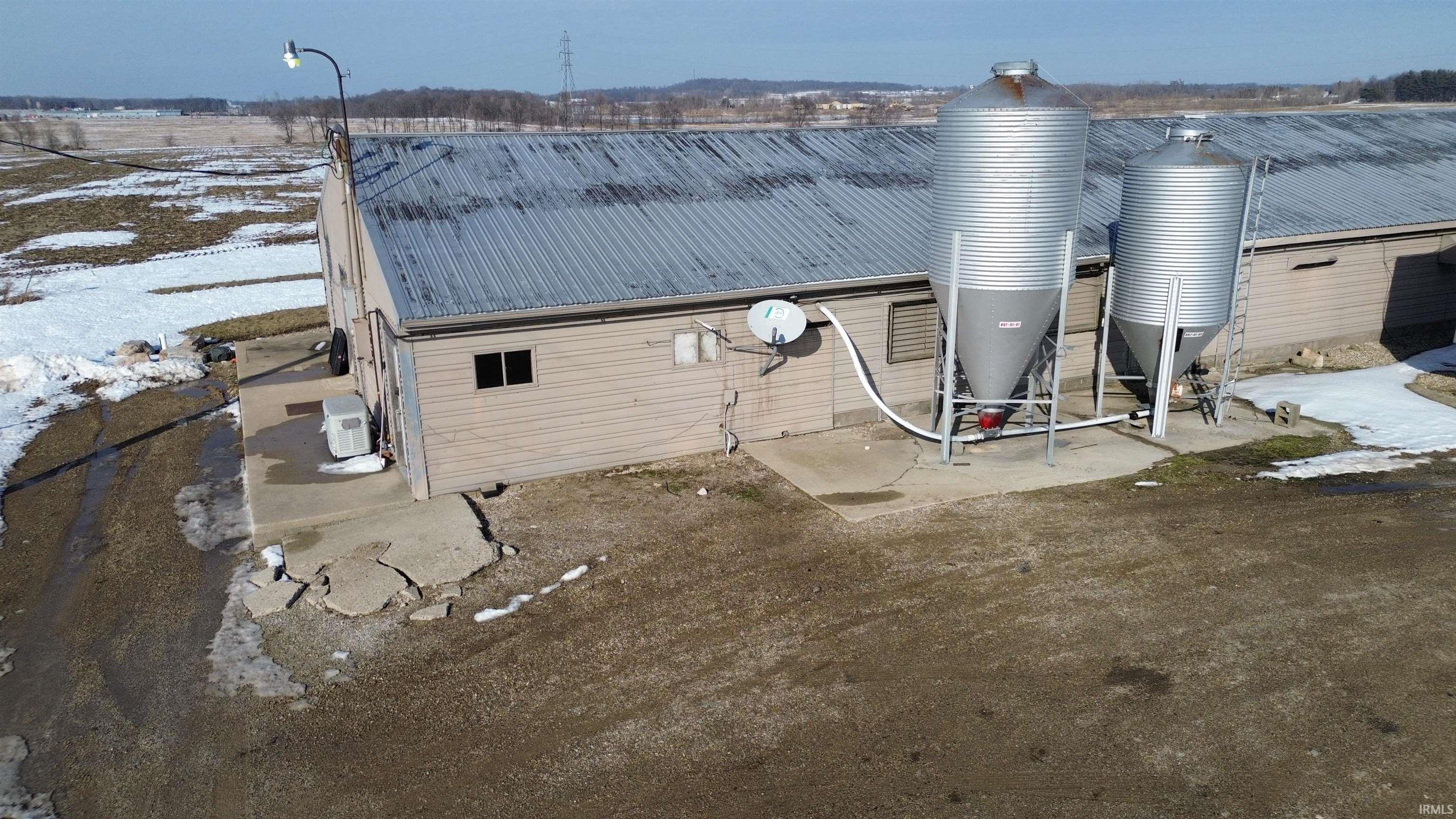 Exterior view of a metal roof and a satellite dish