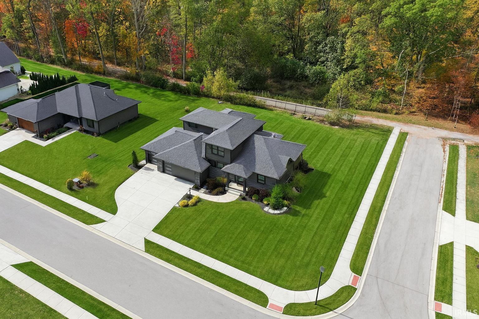 View from above of property featuring a forest