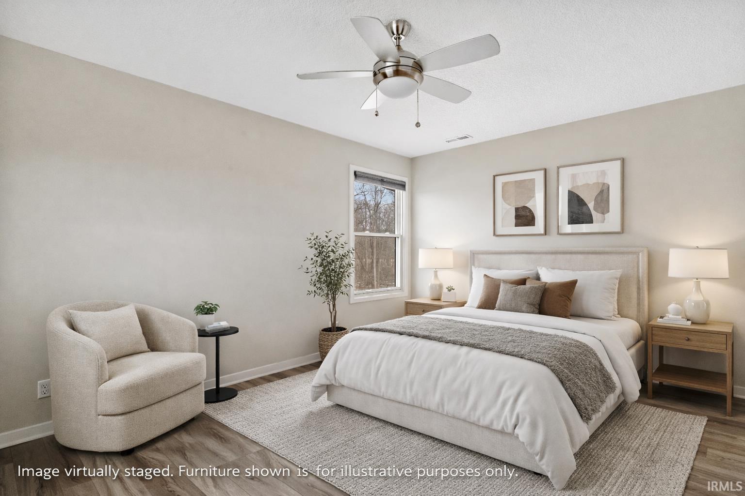 Bedroom with wood finished floors and ceiling fan